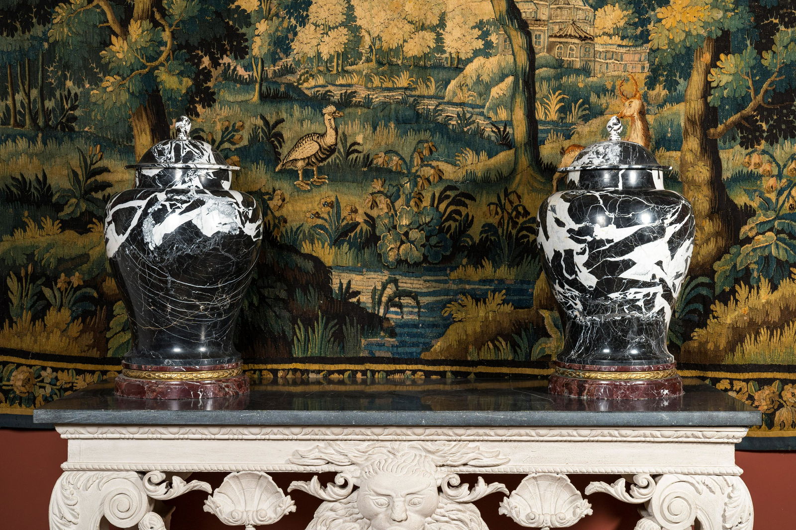 A pair of large black and white 'Grand Antique' marble vases and covers, probably Italy, 19/20th C. (1 of 8)