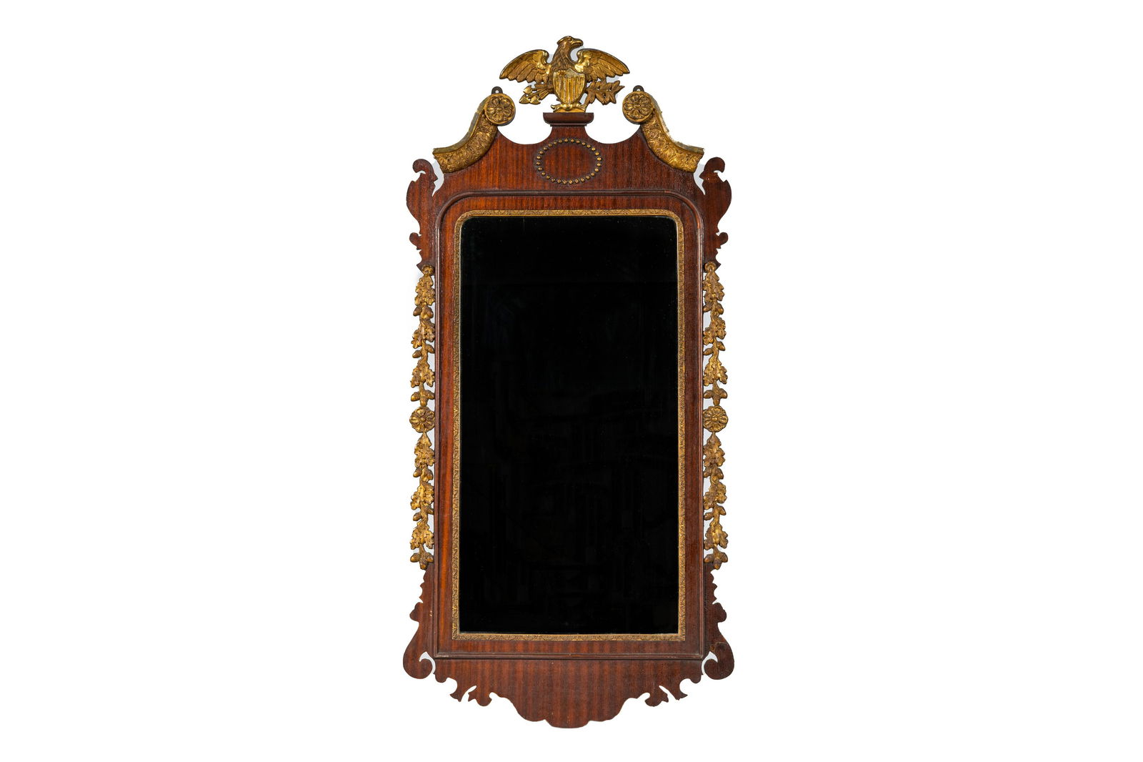 A gilt copper-mounted mahogany mirror with an American eagle, 19/20th C. (1 of 2)