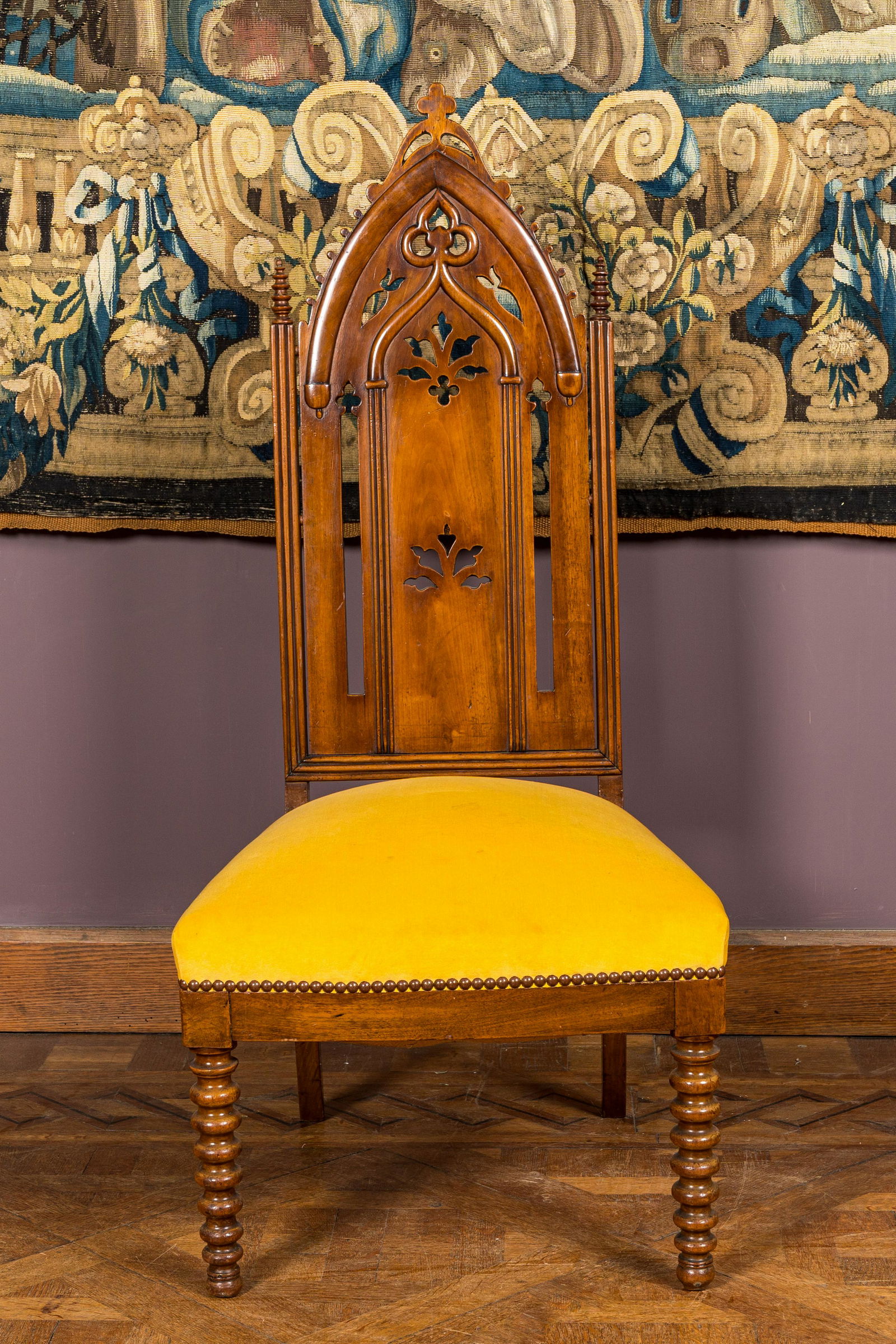 An English Victorian Gothic Revival oak high back arm chair, 19th C. (1 of 3)