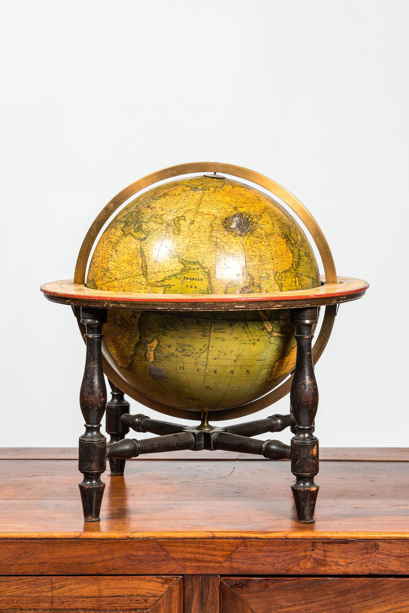 An English globe in wooden stand with brass meridian ring, G.F. Cruchley, London, 19th C. (1 of 2)