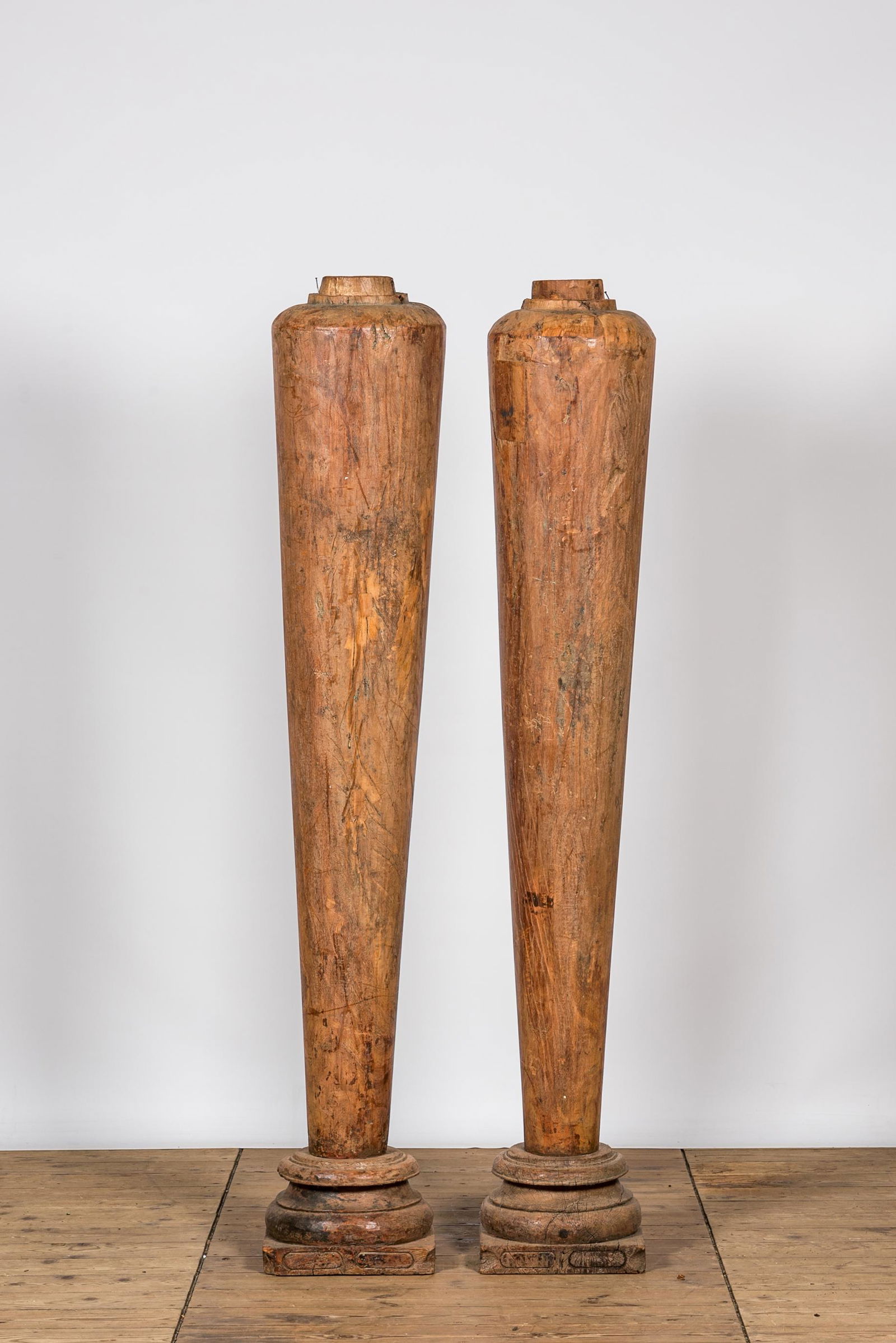 A pair of teak wooden columns on foot, Kerala, India, 19/20th C. (1 of 2)