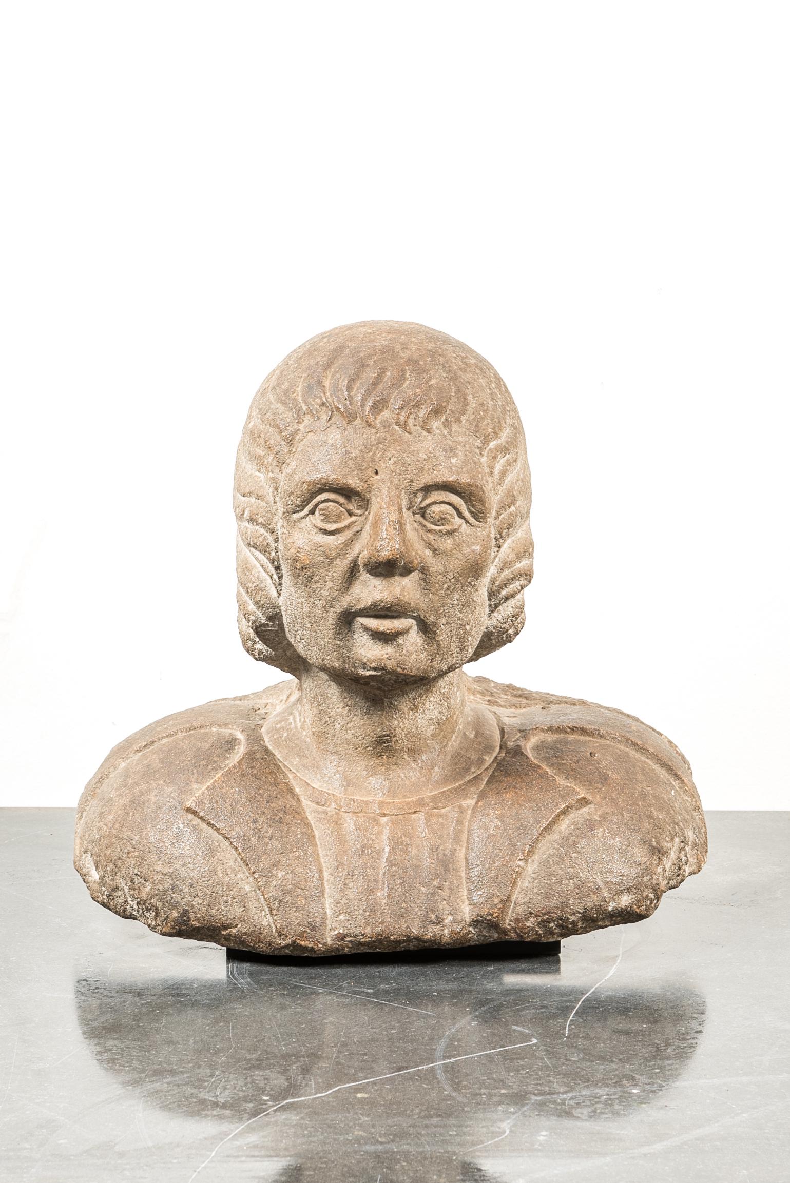 A brown stone bust of a male in armour, Northern Italy, 15th C. (1 of 3)