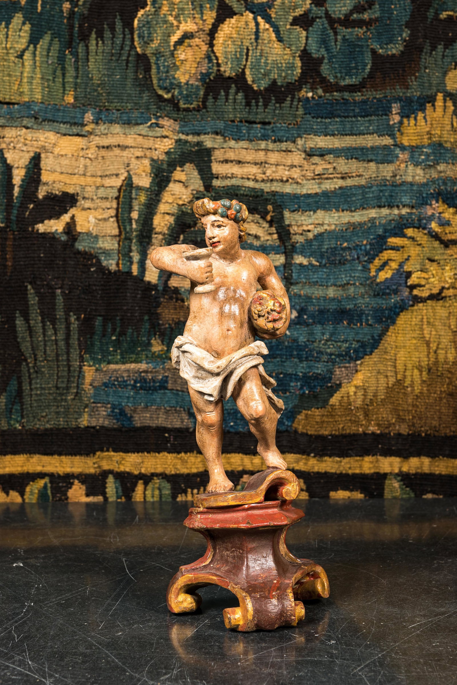 A polychromed wooden sculpture of Bacchus, 18th C.: Full title: A polychromed wooden sculpture of Bacchus, 18th C. Description: H 28 cm About this sale: Paul De Grande is one of the major dealers of antique furniture, fine sculptures and decorative art