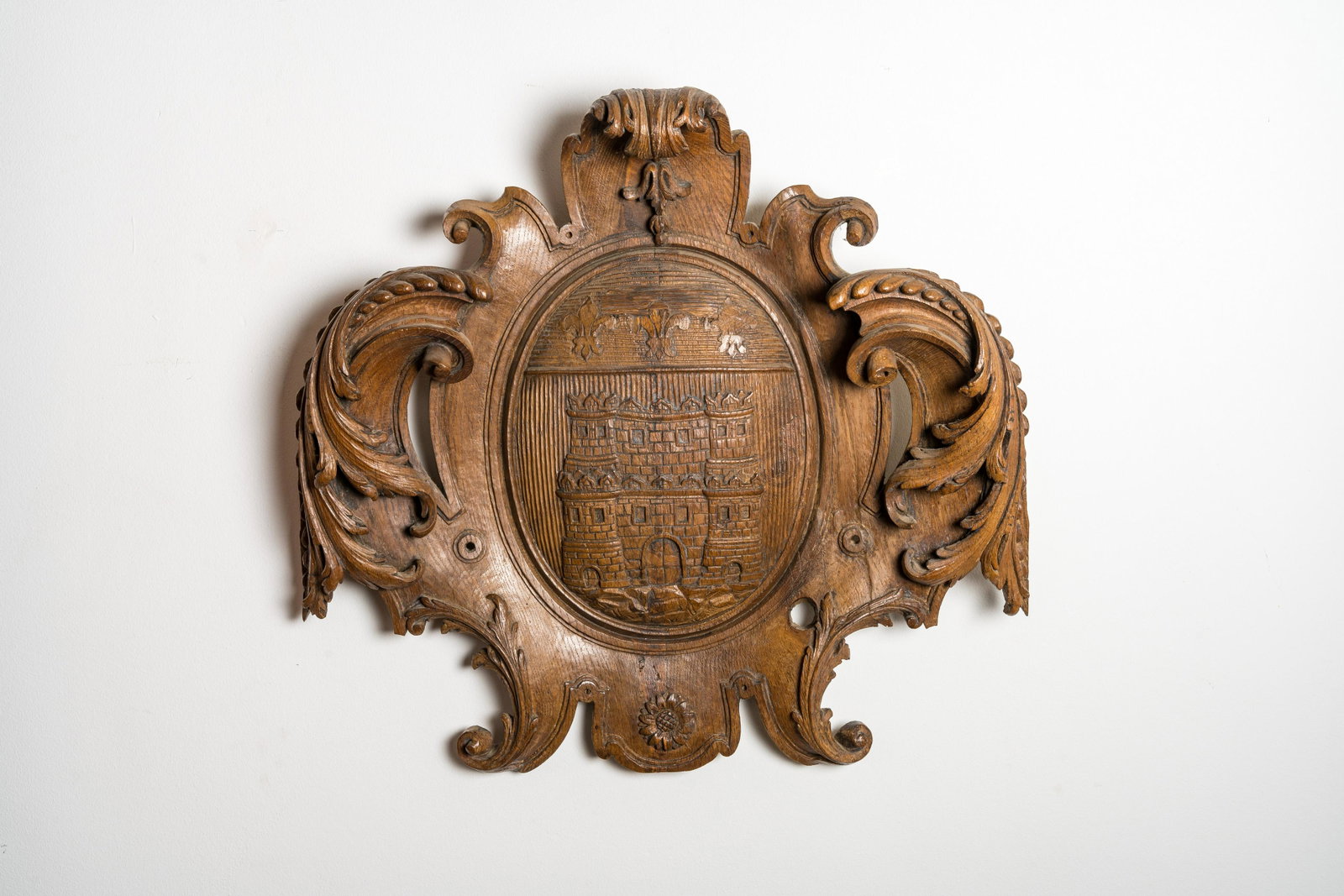 A large wooden relief with the arms of the city of Tournus, France, 18th C.: Full title: A large wooden relief with the arms of the city of Tournus, France, 18th C. Description: H 62 x L 66 cm About this sale: Paul De Grande is one of the major dealers of antique furniture, fi
