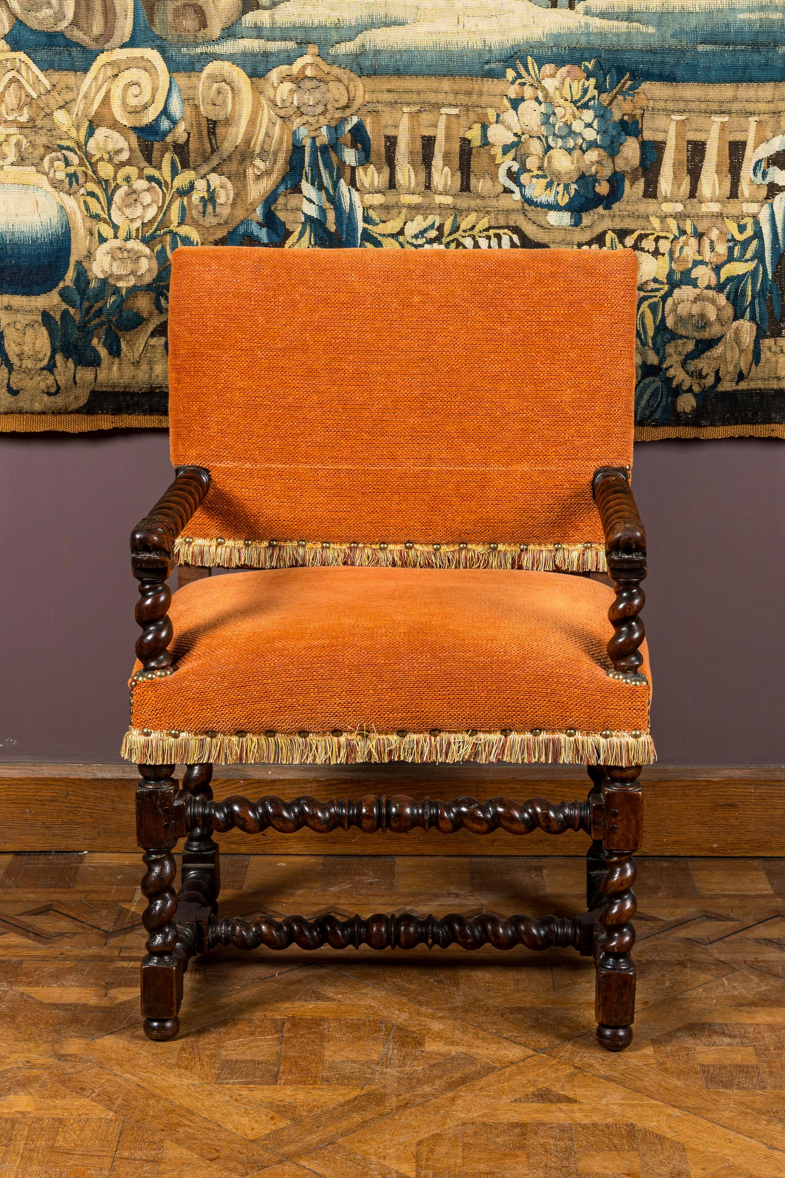 A baroque walnut 'barley twist' armchair with lions' heads, 17th C. (1 of 3)