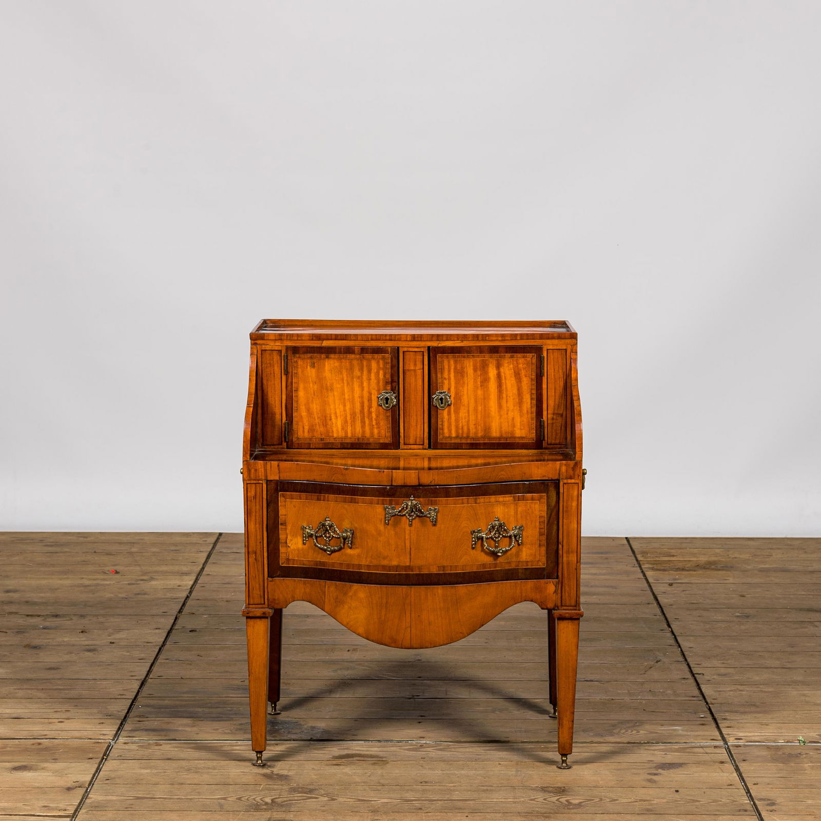 A Dutch Neoclassical fruitwooden bedside table, 19th C. (1 of 2)