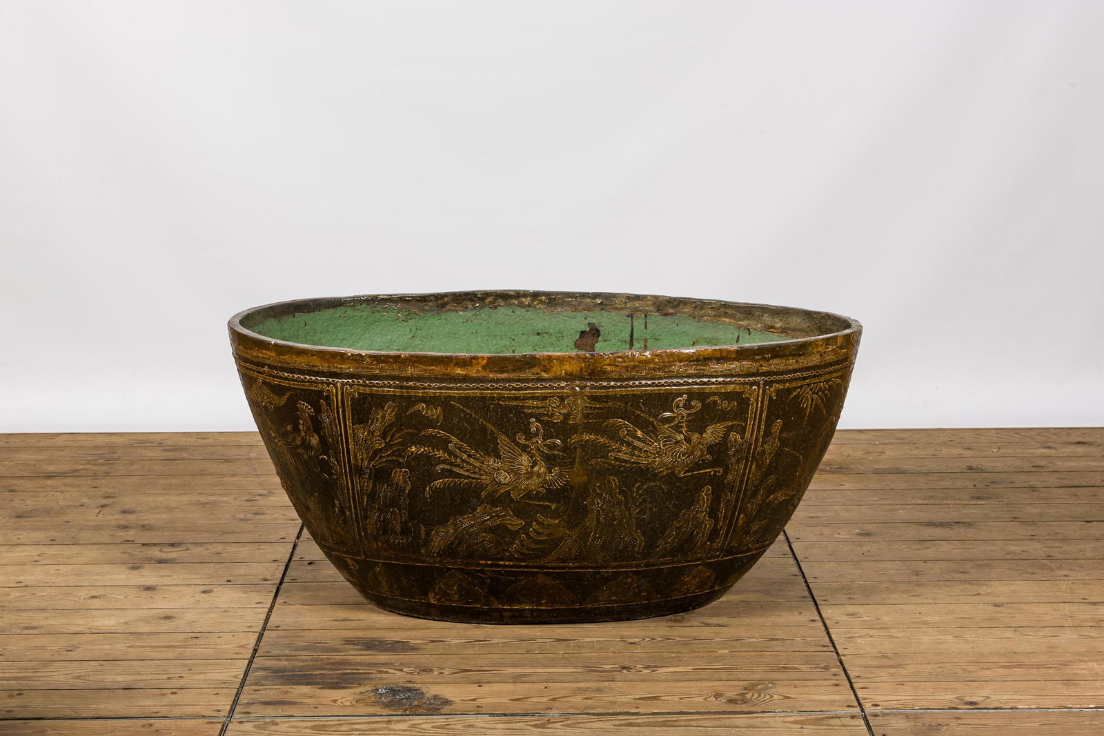 An exceptionally large Chinese or Vietnamese oval 'dragon and phoenix' pottery basin, 18/19th C. (1 of 6)