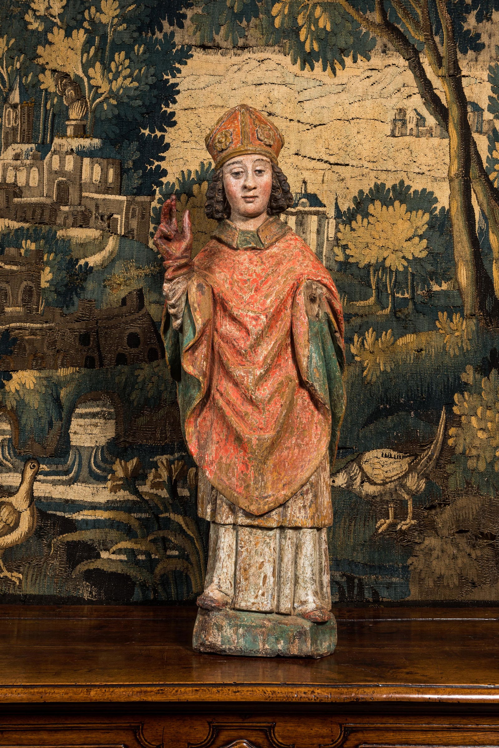 A large German polychromed oak figure of a bishop, Upper Rhine area, late 15th C. (1 of 2)