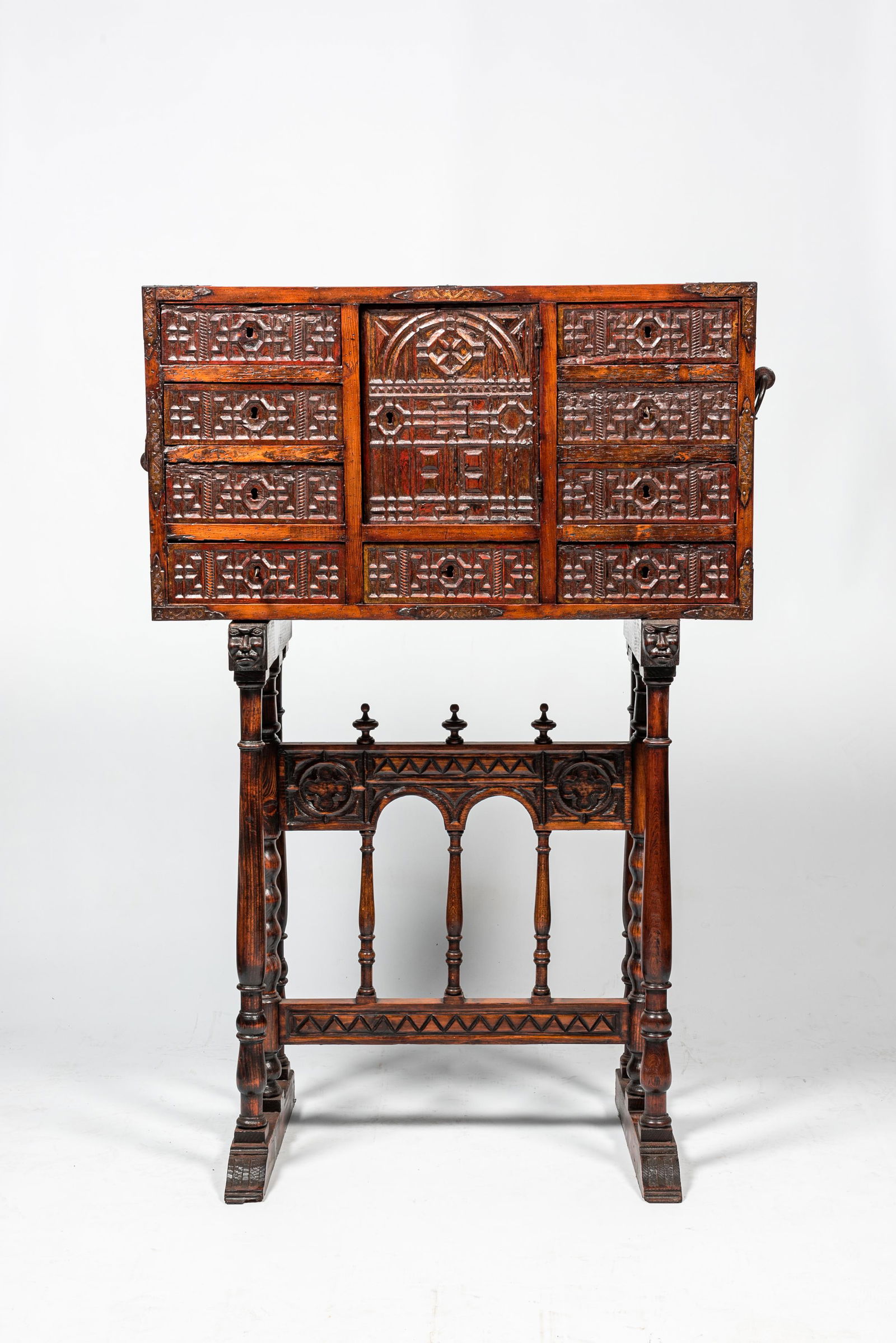 A Spanish wooden 16th-C. style 'bargueÃ±o' cabinet on foot, 19th C. (1 of 3)