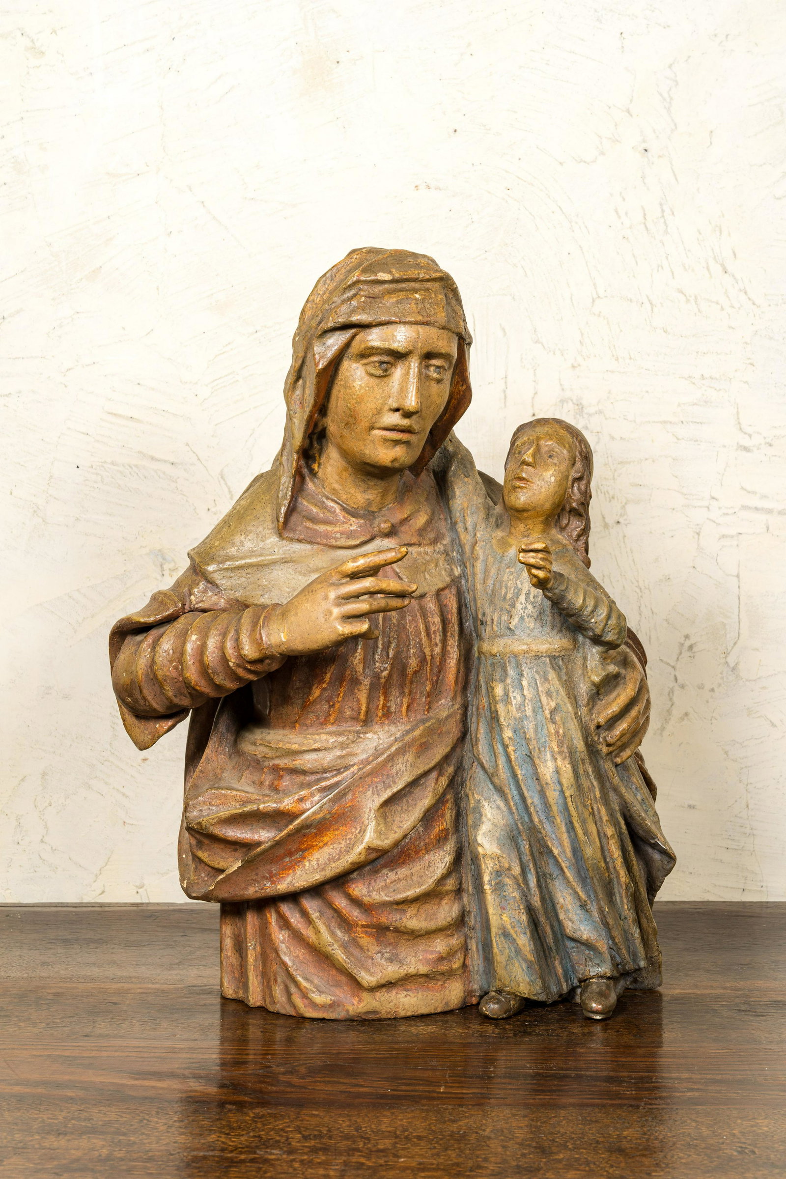 A German polychromed basswooden Saint Anne teaching the Virgin, ca. 1600: Full title: A German polychromed basswooden Saint Anne teaching the Virgin, ca. 1600 Description: H 51 cm Expert: Cabinet Benoit Bertrand About this sale: Paul De Grande is one of the major dealers of