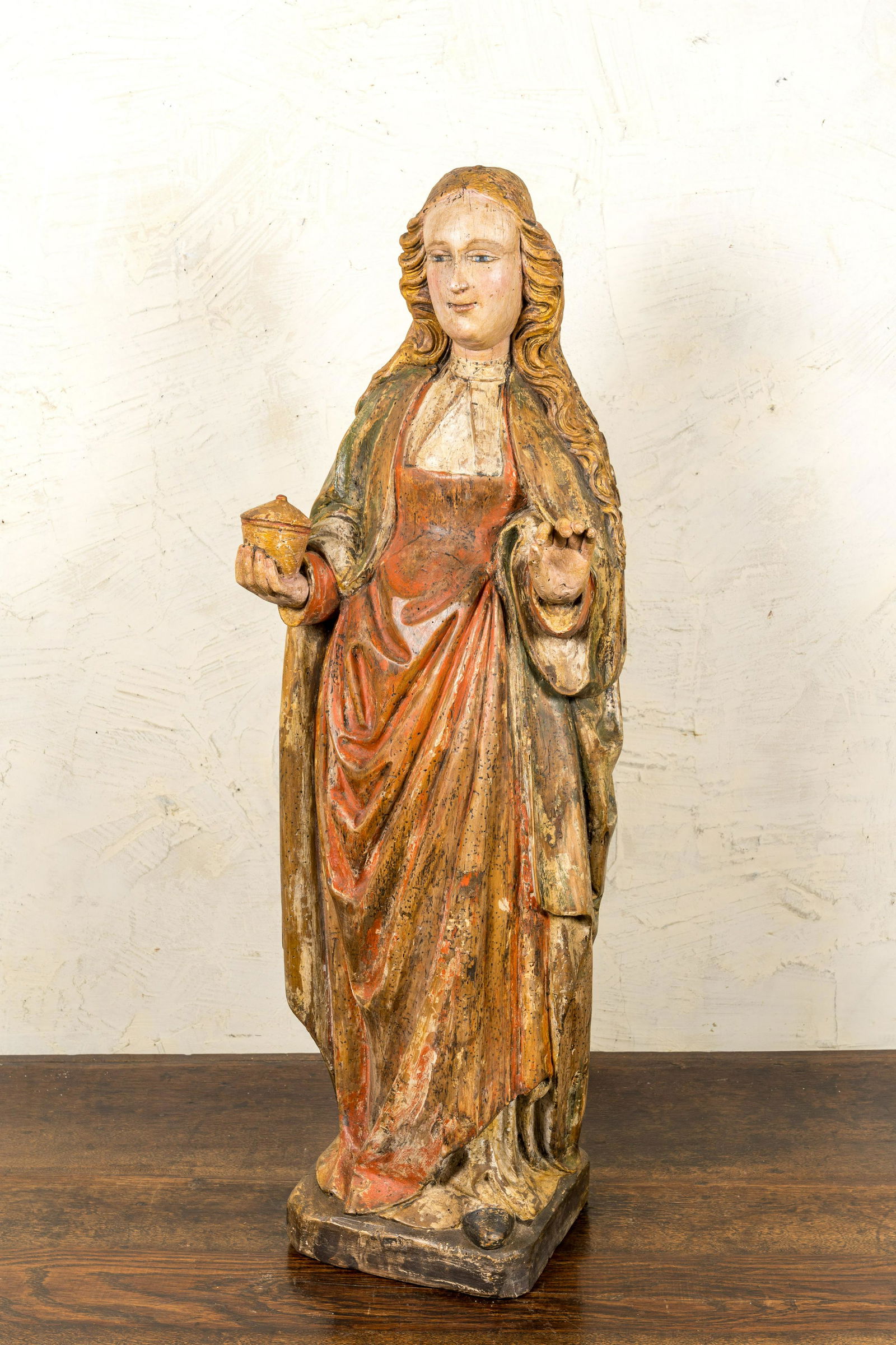 A German walnut sculpture of one of the holy female myrrhbearers, Lower Rhine area, early 16th C. (1 of 3)