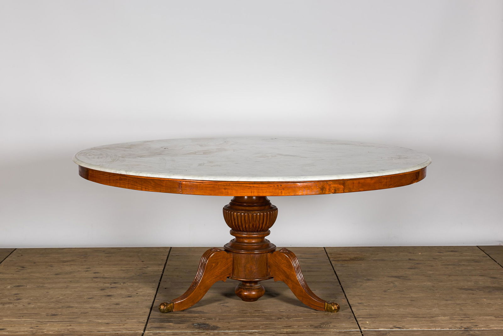 A large round French tripod Louis Philippe table with a white marble top, 19th C. (1 of 4)