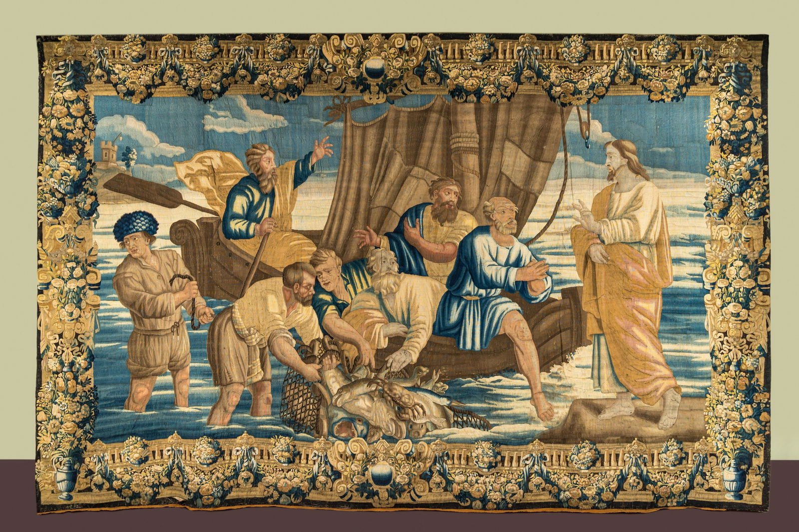 A large Flemish wall tapestry of 'The Miraculous Draft of Fishes', Oudenaarde, 16/17th C. (1 of 9)