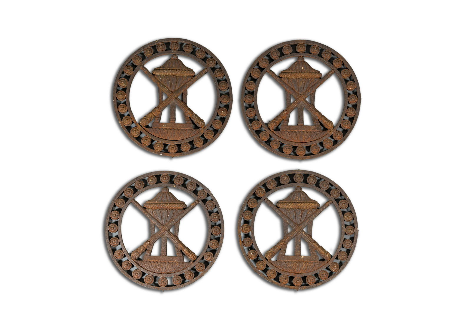 Four French Louis XVI-style iron medallions with an urn, 19/20th C. (1 of 2)