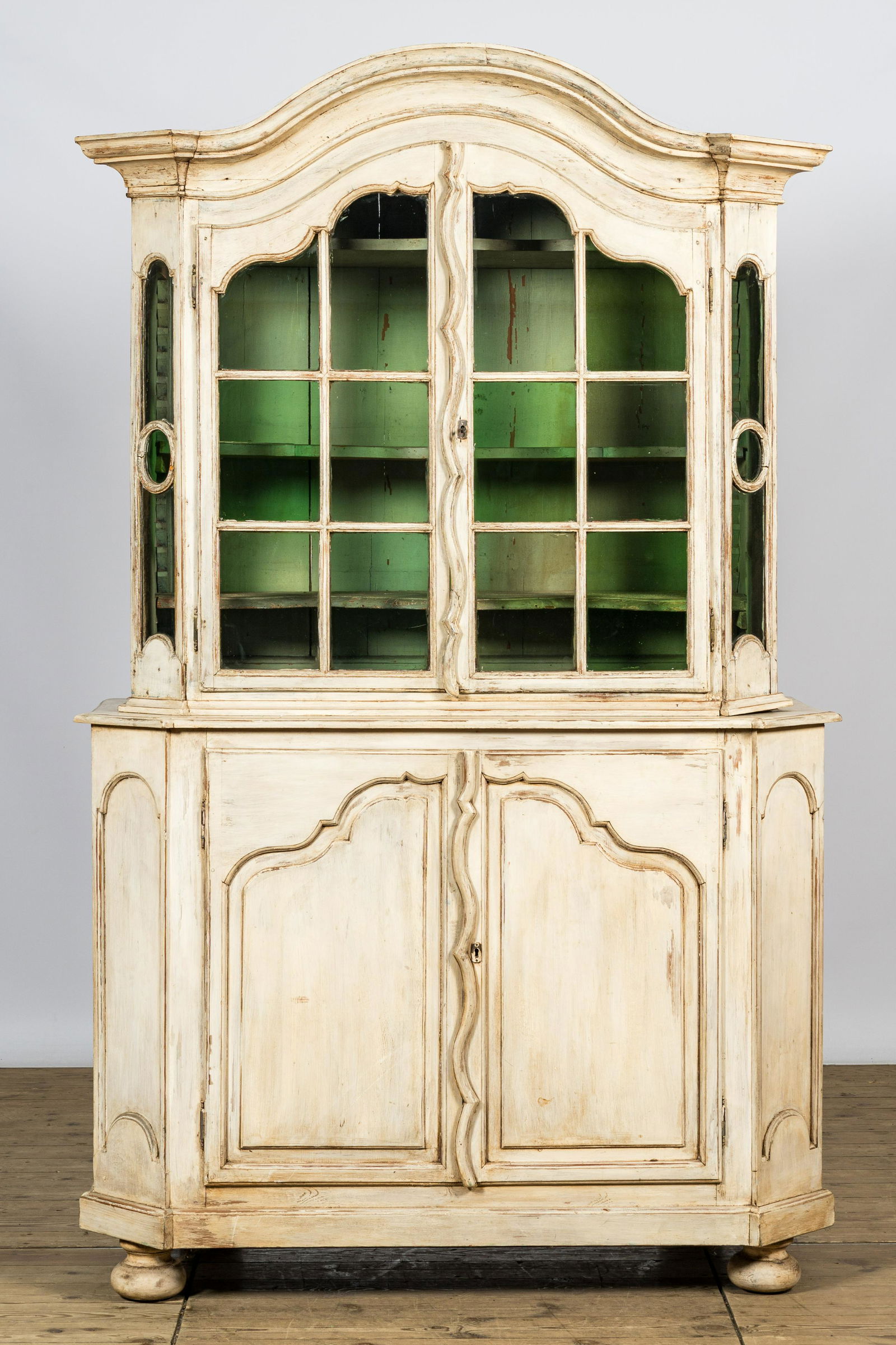 A patinated wooden display cabinet, 19th C. (1 of 3)