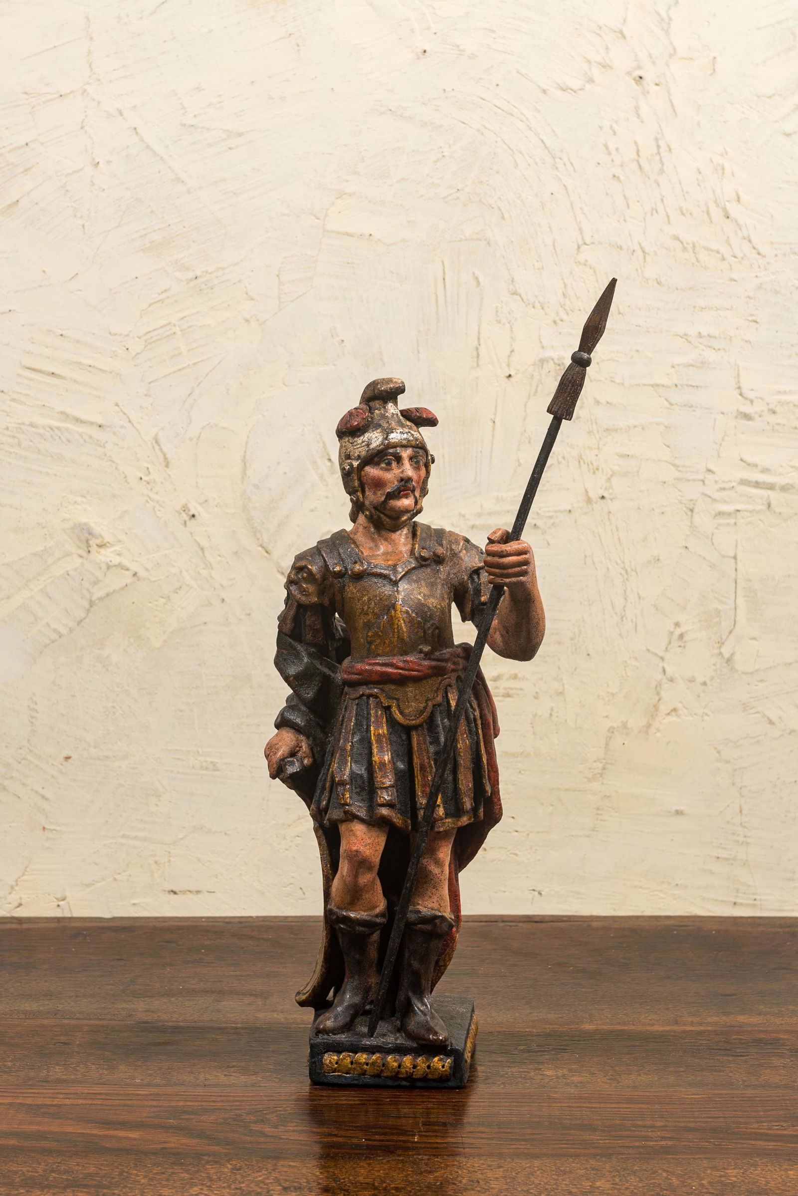 A polychrome wooden sculpture of a Roman soldier, 17/18th C. (1 of 2)