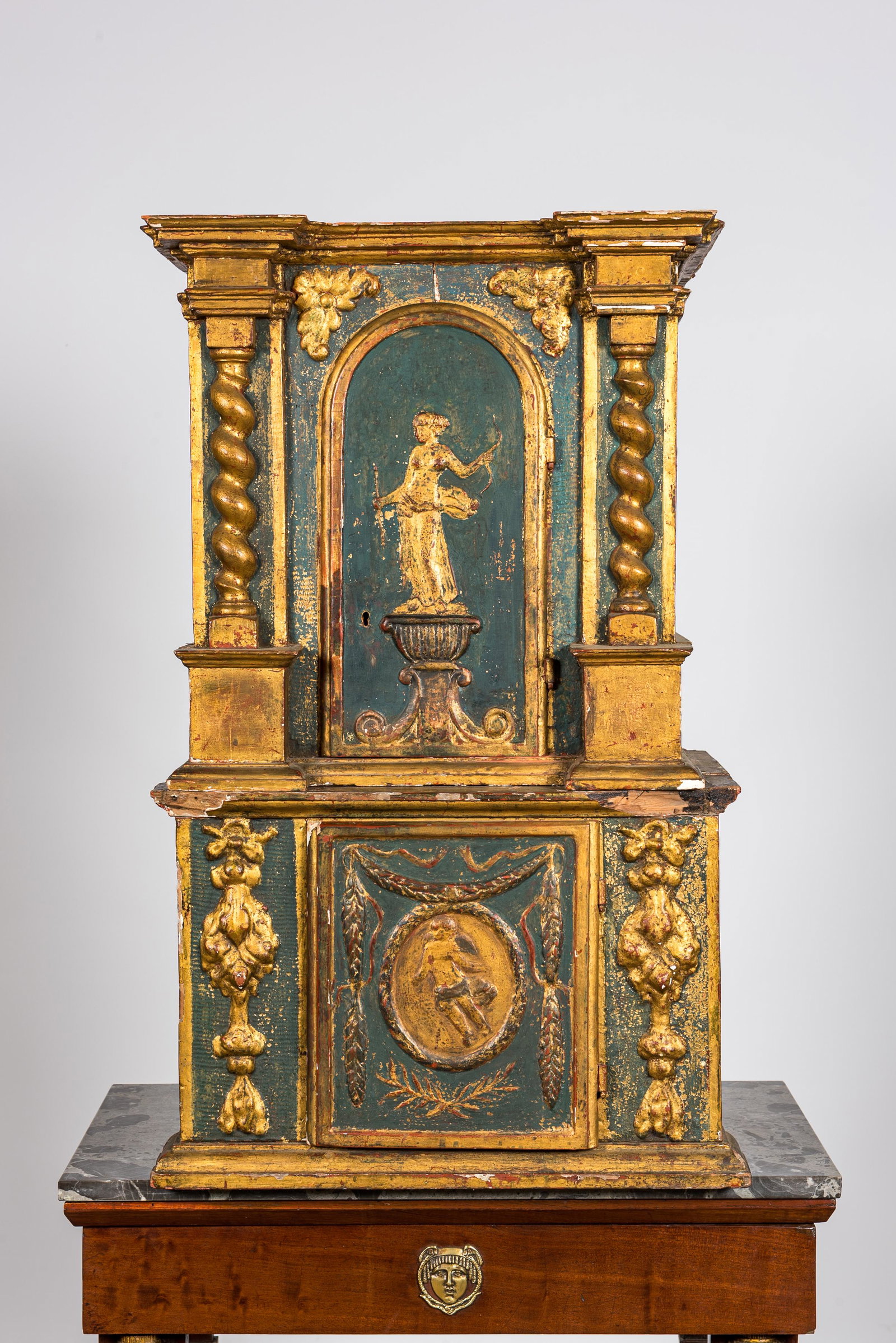 A two-part gilt and polychrome wooden tabernacle, 18th C.: Full title: A two-part gilt and polychrome wooden tabernacle, 18th C. Description: H 87 x L 51 x D 43,5 cm About this sale: Paul De Grande is one of the major dealers of antique furniture, fine sculpt