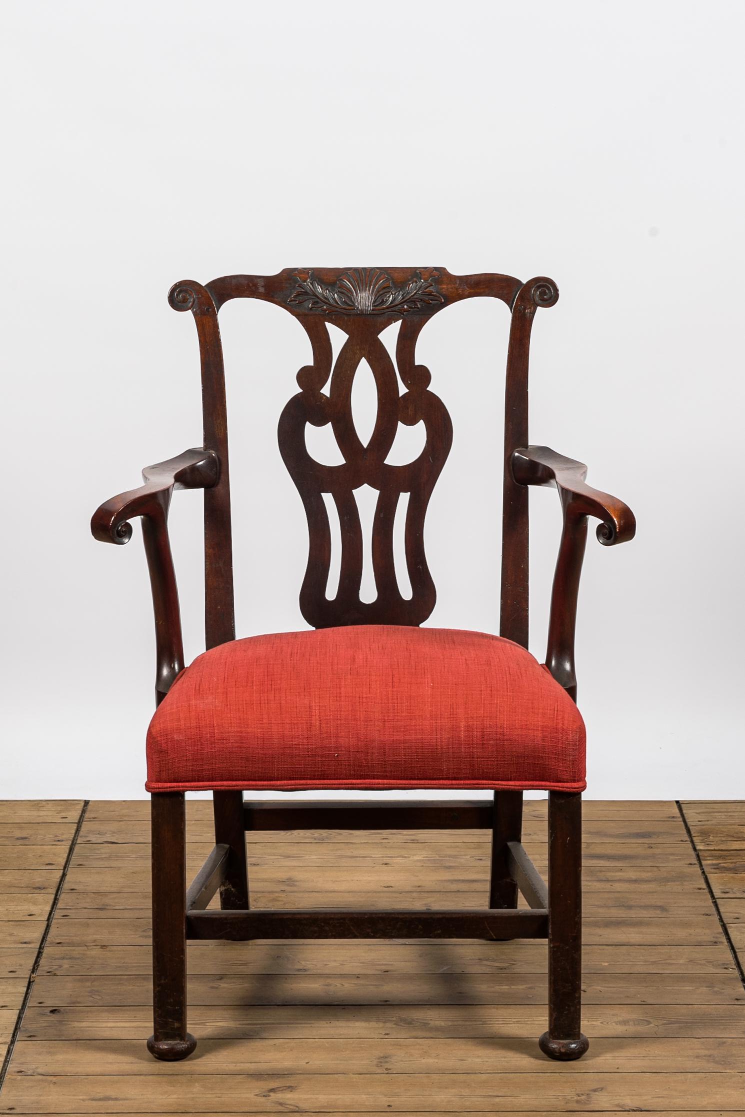 An English mahogany upholstered armchair, 19th C. (1 of 5)