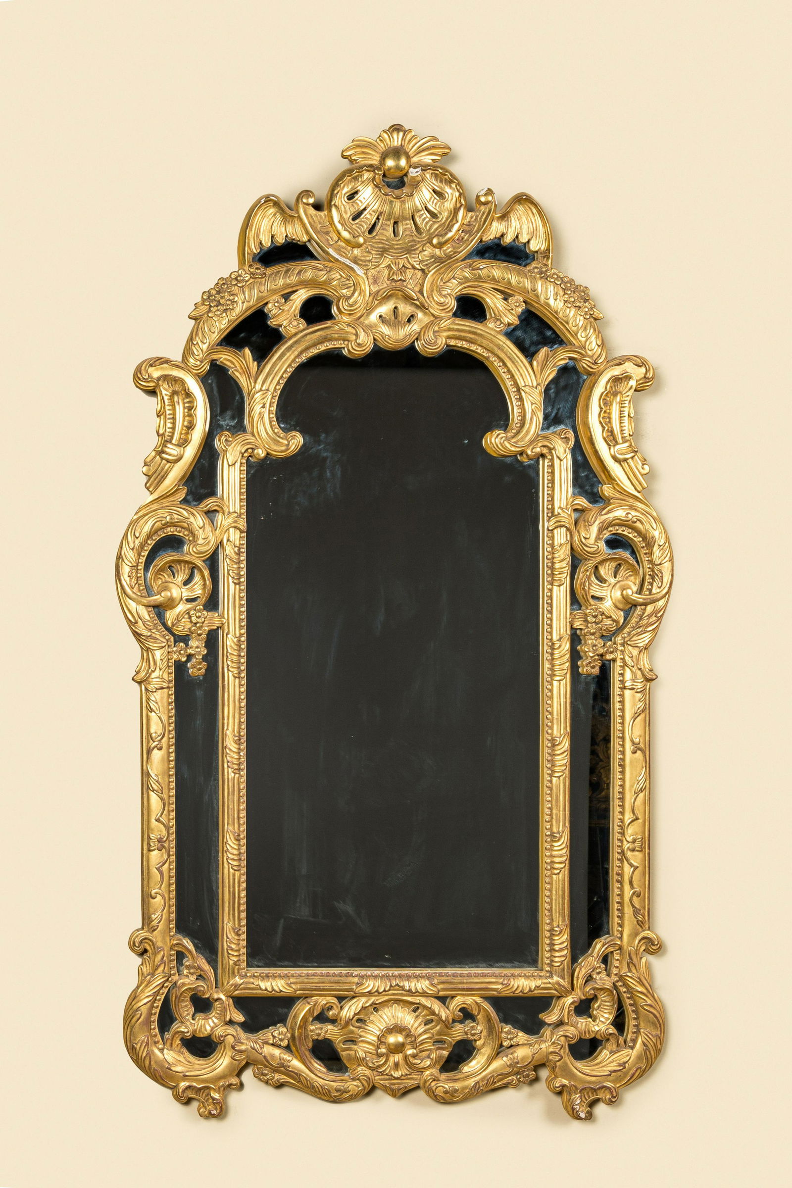 A French carved and gilt wooden mirror, 19th C. (1 of 1)
