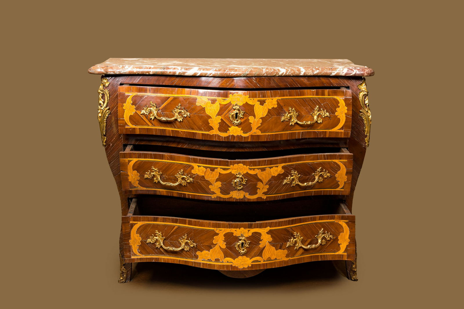 A French mahogany veneered commode a tombeau with floral marquetry, marble top and gilt bronze (1 of 2)