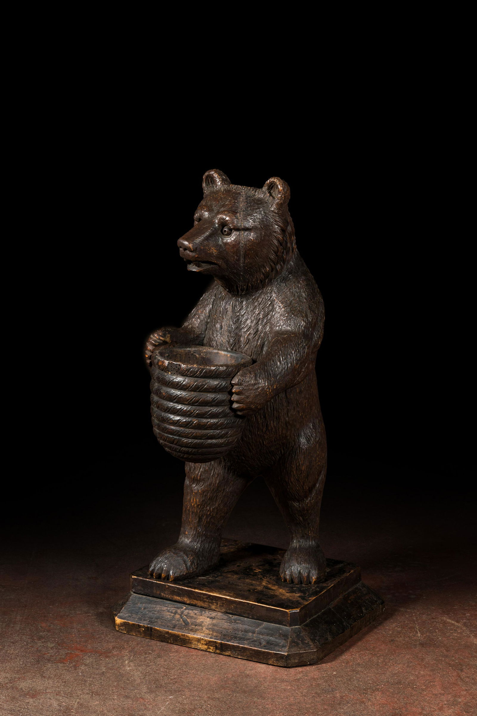 A 'Black Forest' wooden bear holding a beehive, Switzerland, 19th C. (1 of 5)