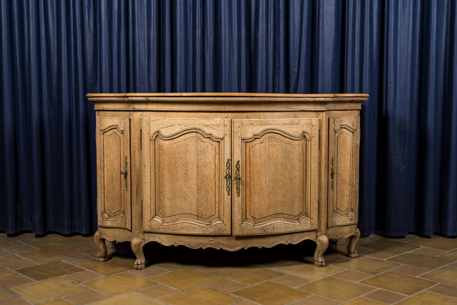 A French oak wooden four-door sideboard, 18/19th C. (1 of 2)