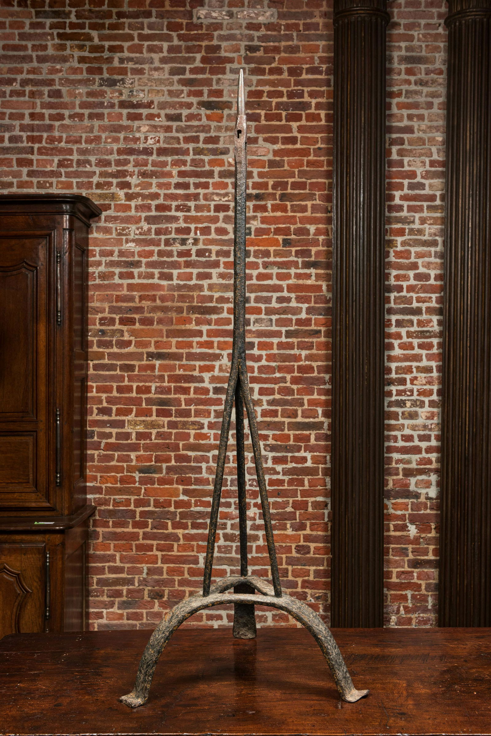 A large wrought iron pricket candlestick, probably 15/16th C. (1 of 1)