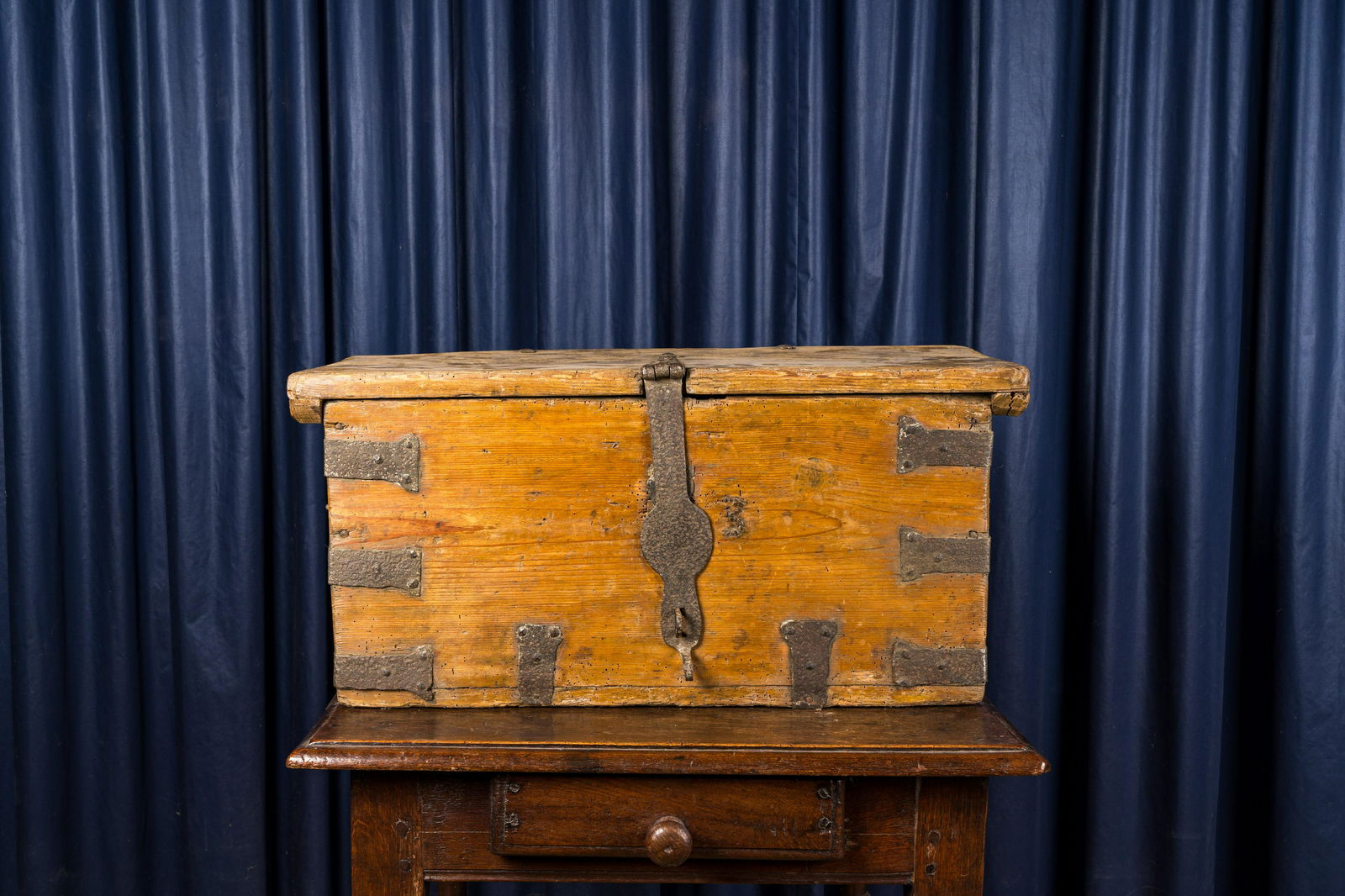 A wooden trunk with wrought iron mounts, 18th C. (1 of 3)