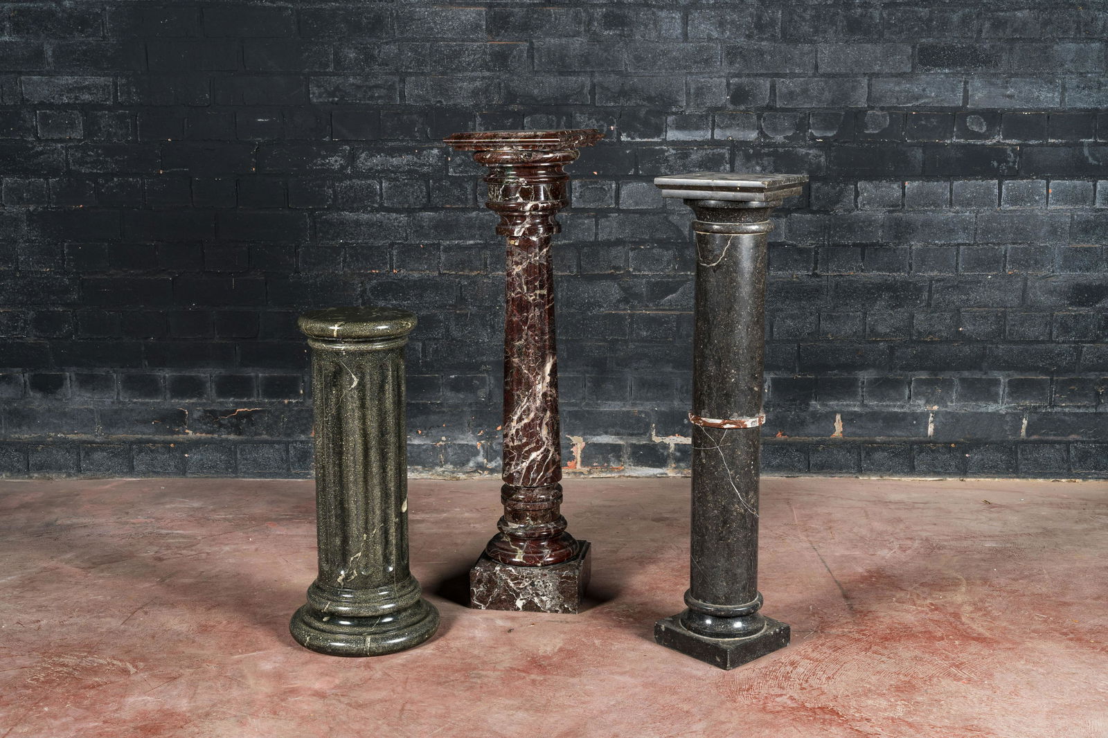 Two marble stands and one faux-marble-painted wooden stand, 19/20th C. (1 of 2)