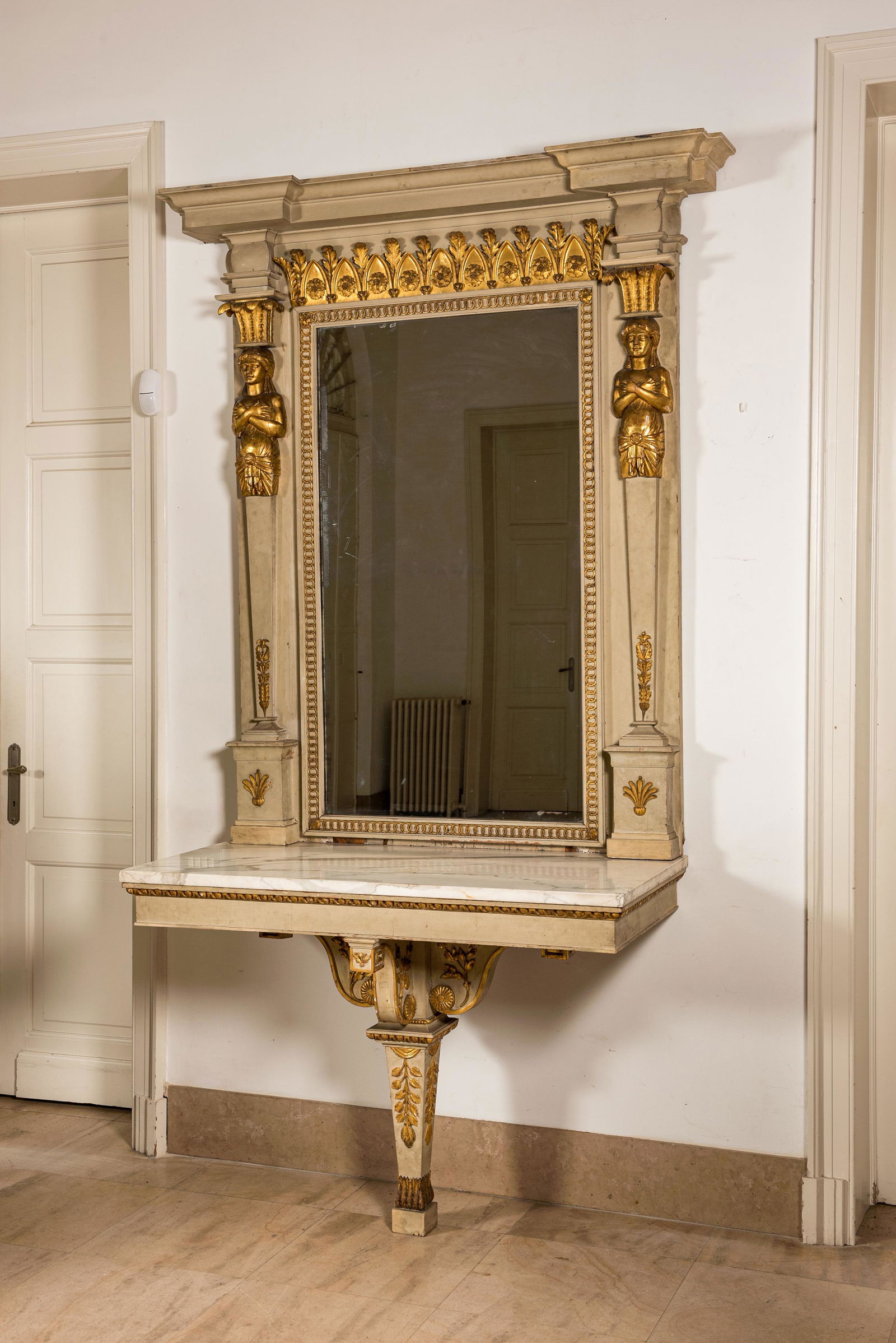 An impressive French Empire-style gray-patinated and gilt wooden mirror console with marble top, (1 of 5)