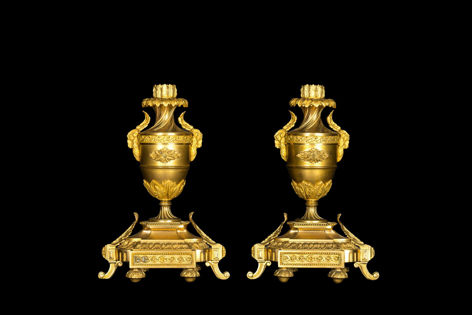 A pair of French gilt bronze Empire-style candlesticks, 19th C. (1 of 3)