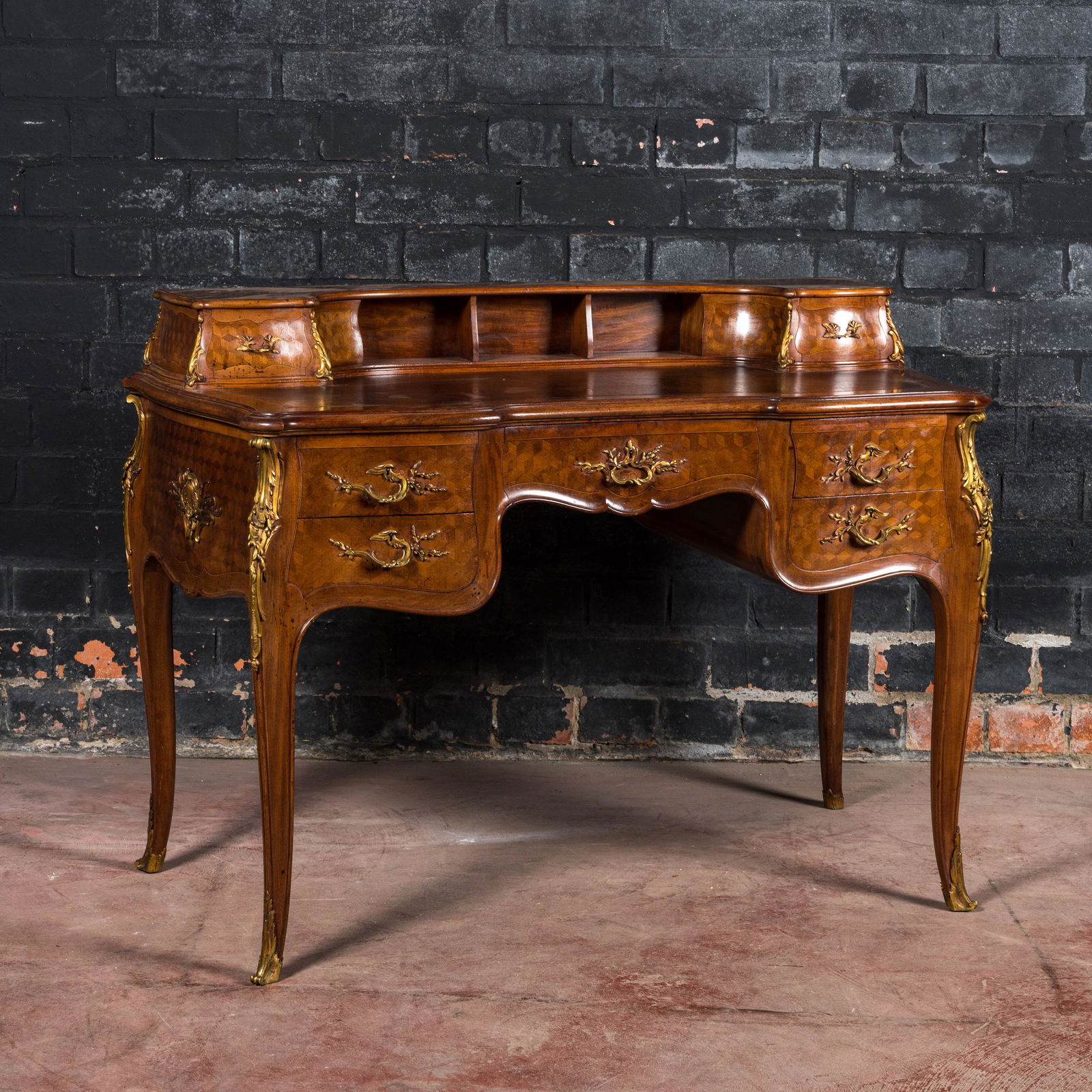 A mahogany and boxwood gilt bronze-mounted bureau, signed FranÃ§ois Linke, France, late 19th C. (1 of 4)