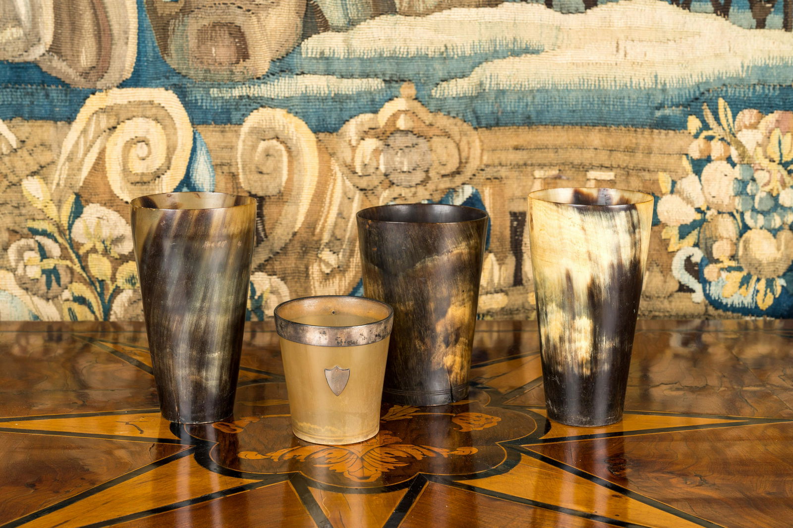Four turned horn beakers of which one mounted with silver, probably Germany, 19th C. (1 of 2)