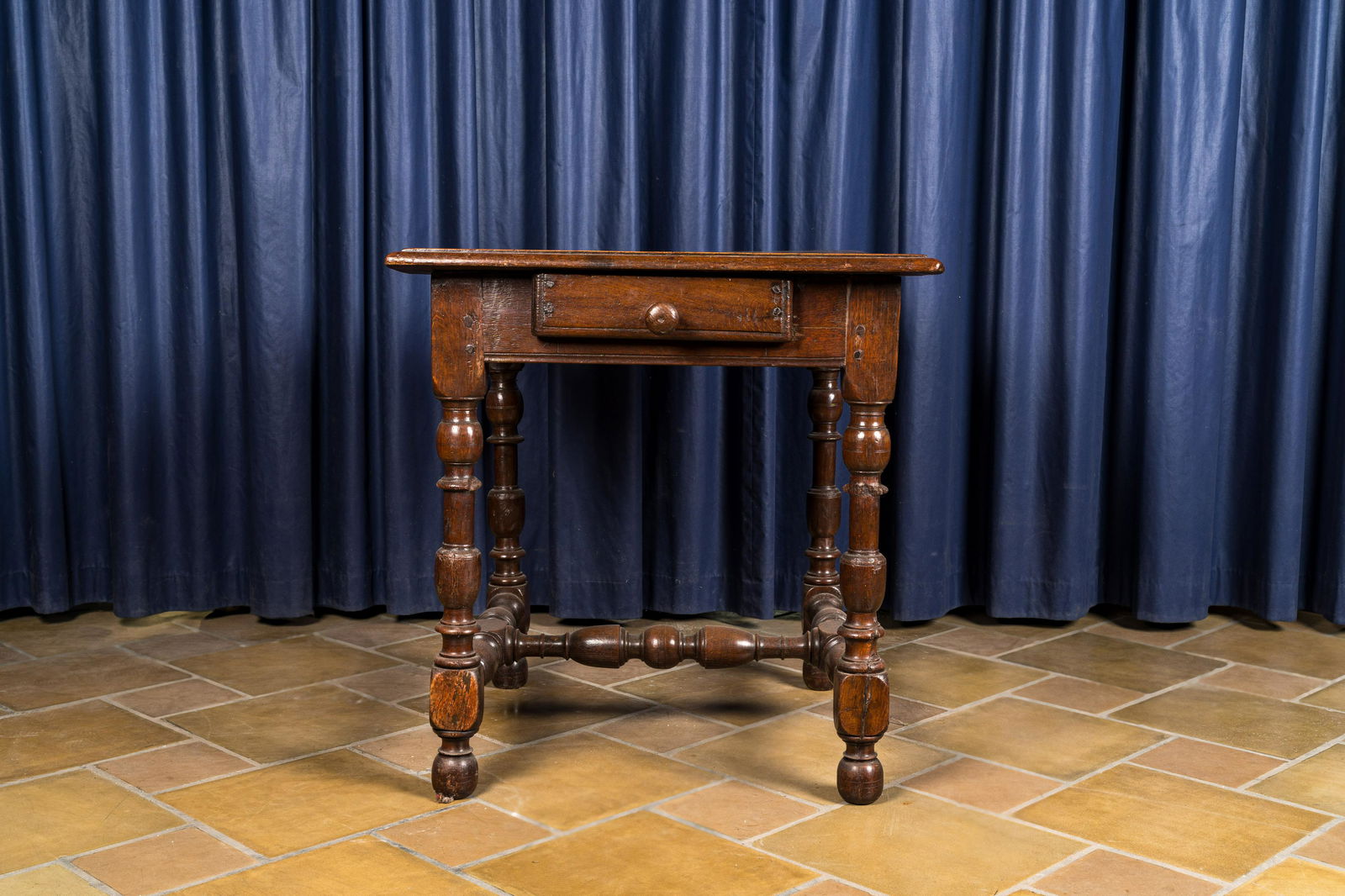 An oak wooden side table with a drawer, 18th C. (1 of 4)