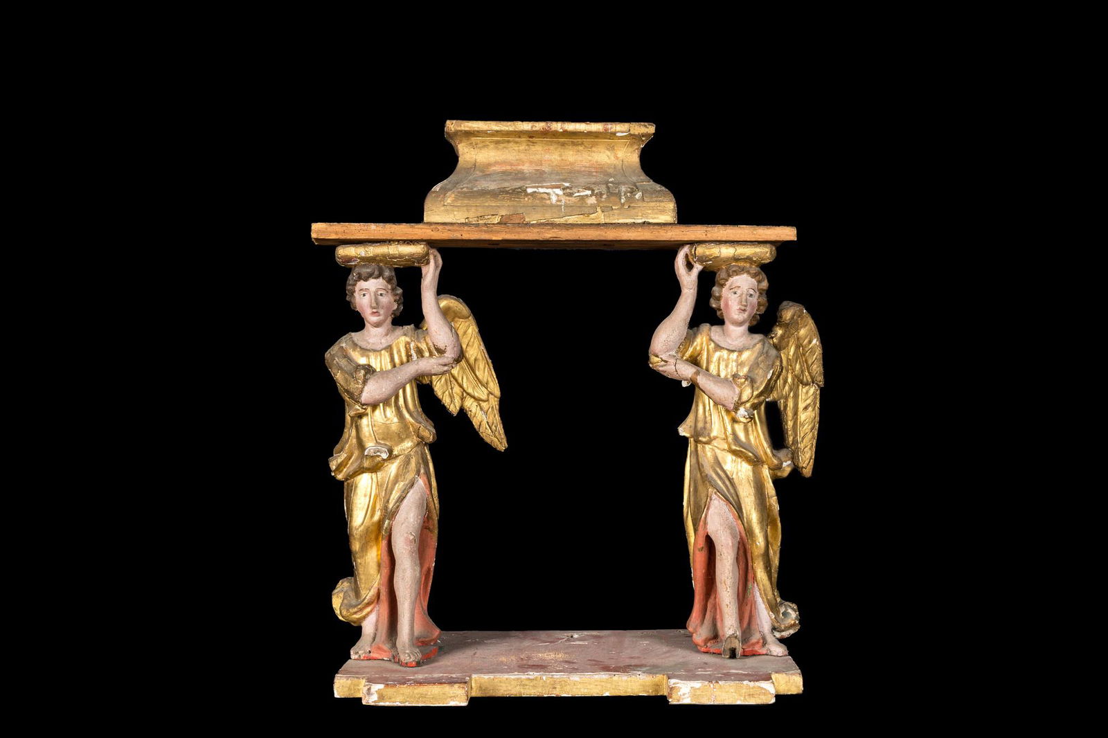 A polychromed and gilt wooden stand supported by two angels, 18th C. (1 of 3)