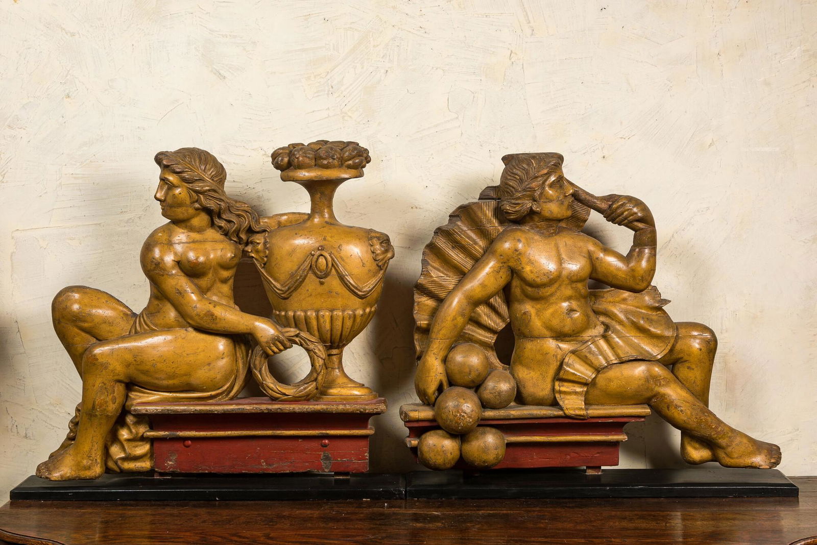 A pair of large polychrome wooden reliefs with war and peace, ca. 1800 (1 of 2)