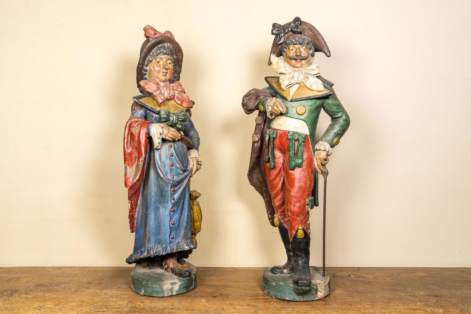 A pair of polychrome terracotta figures of a man and a woman, 18/19th C. (1 of 5)
