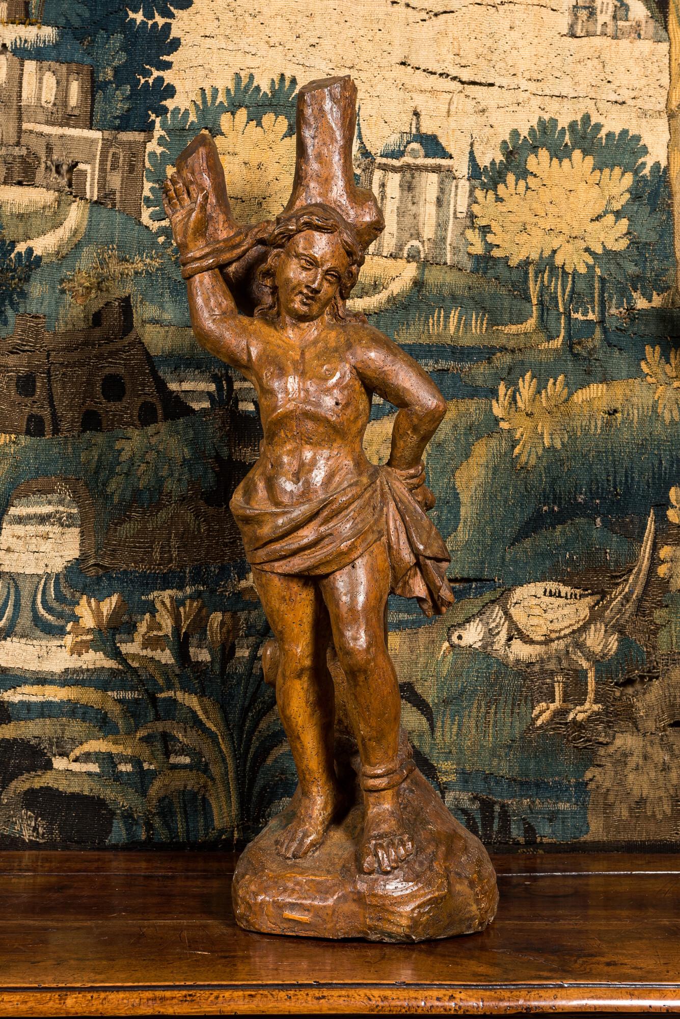 A wooden sculpture of Saint Sebastian with minor traces of polychromy, 16th C. (1 of 2)