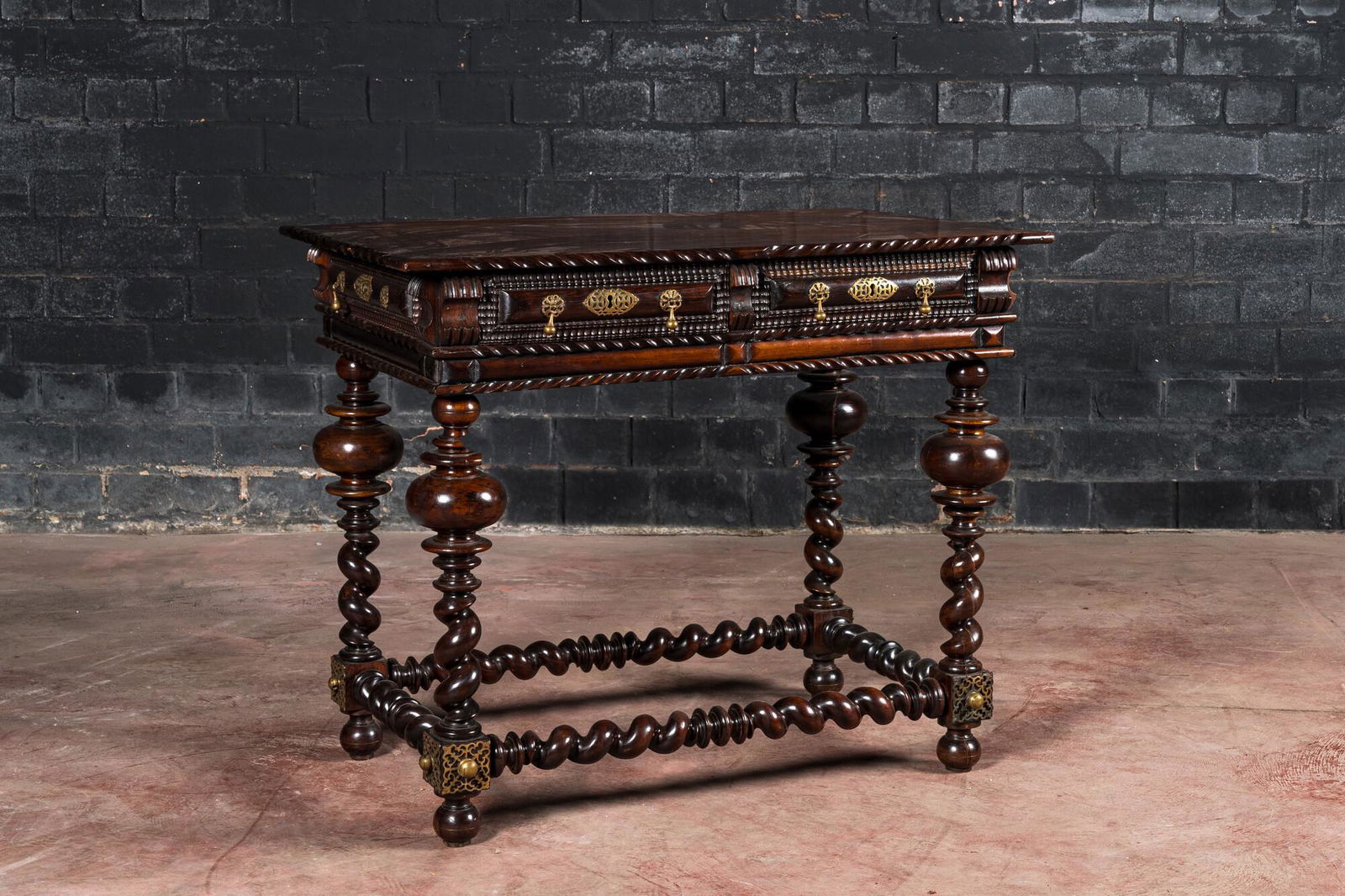 A Portuguese rosewood table with two drawers, 19th C. (1 of 4)