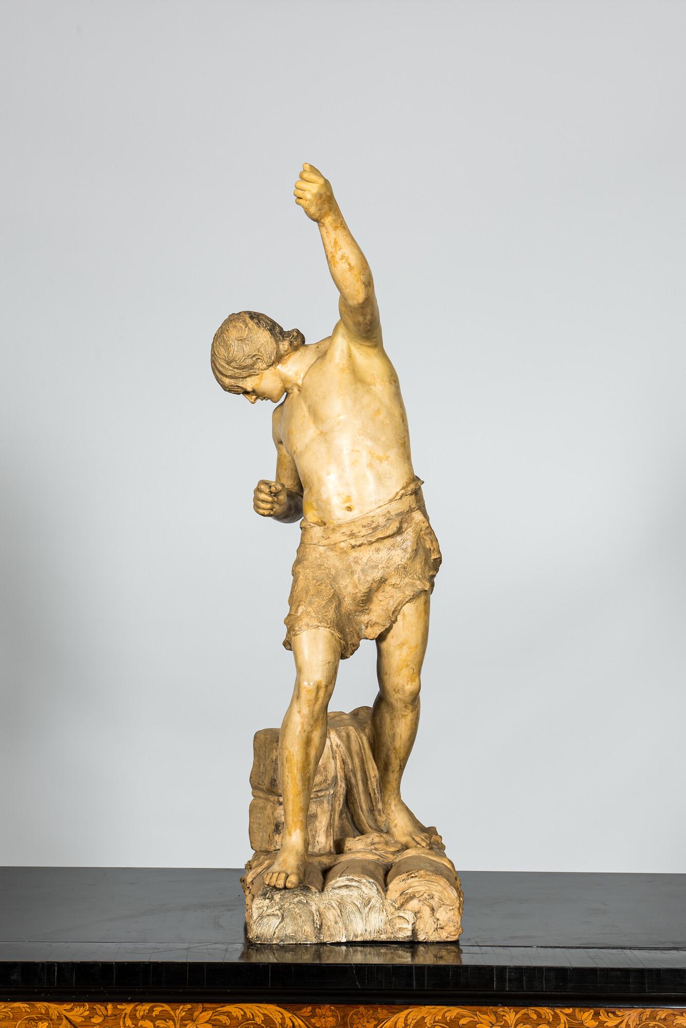 A patinated plaster sculpture of a young man on a raft, 20th C. (1 of 3)