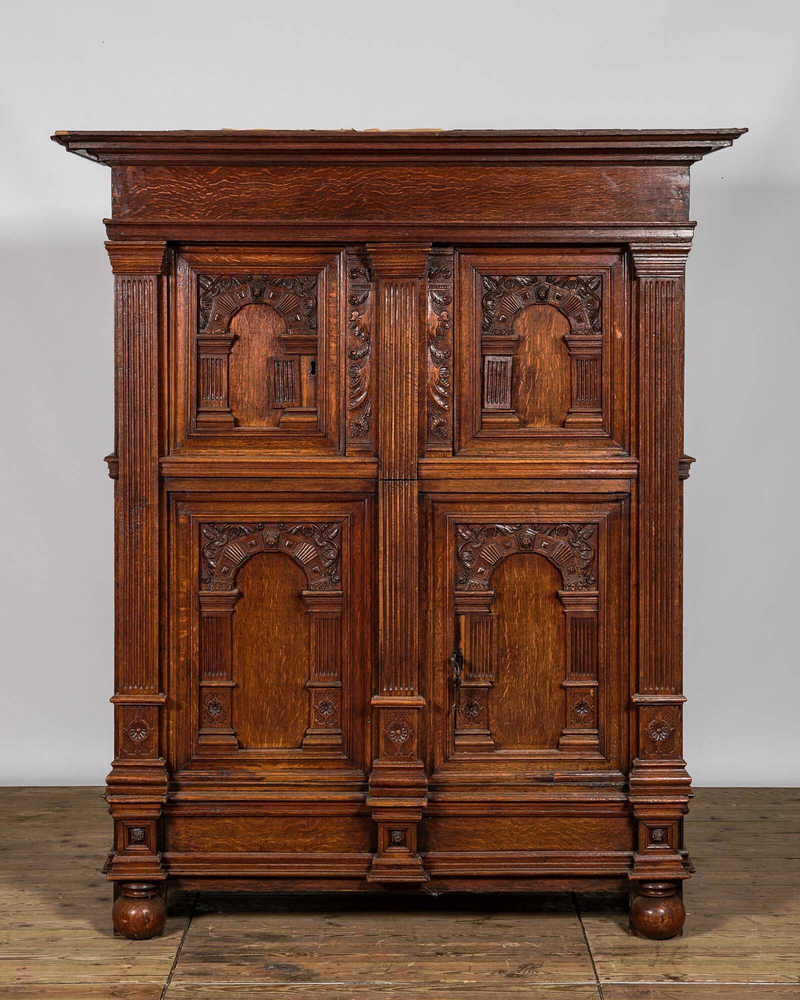 A Dutch oak wooden four-door cupboard, 17th C. (1 of 3)