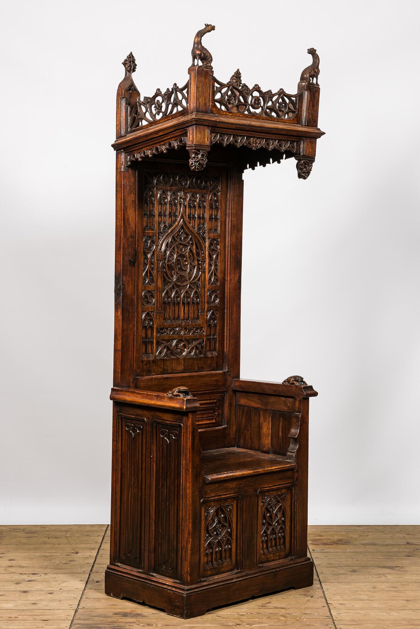 A large Gothic Revival oak hooded throne chair with dragons and frogs, 19th C. (1 of 10)