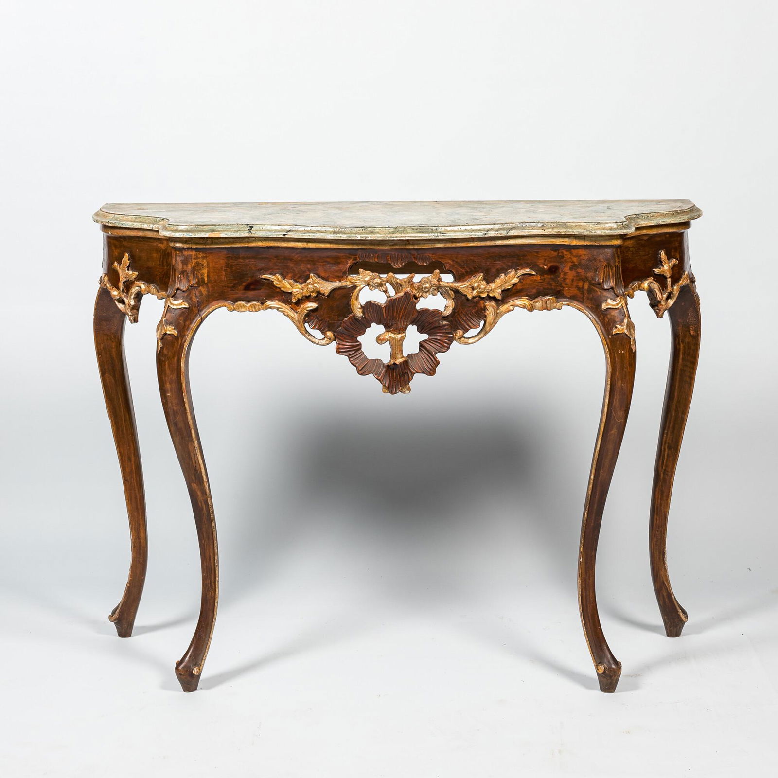 A Louis XV-style patinated wooden console with faux marble top, 19/20th C. (1 of 2)