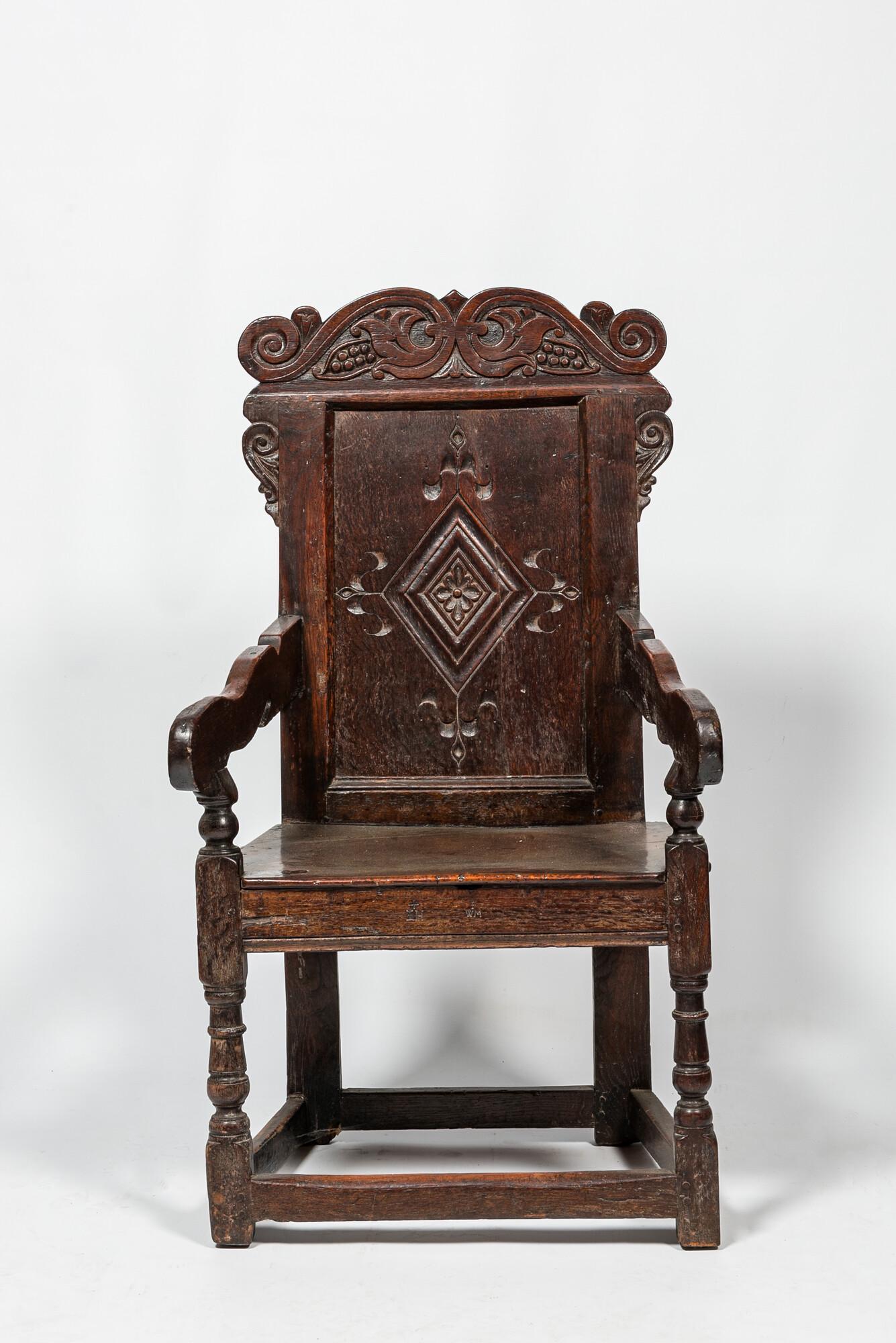 An English walnut and oak wooden armchair, 18th C. (1 of 3)