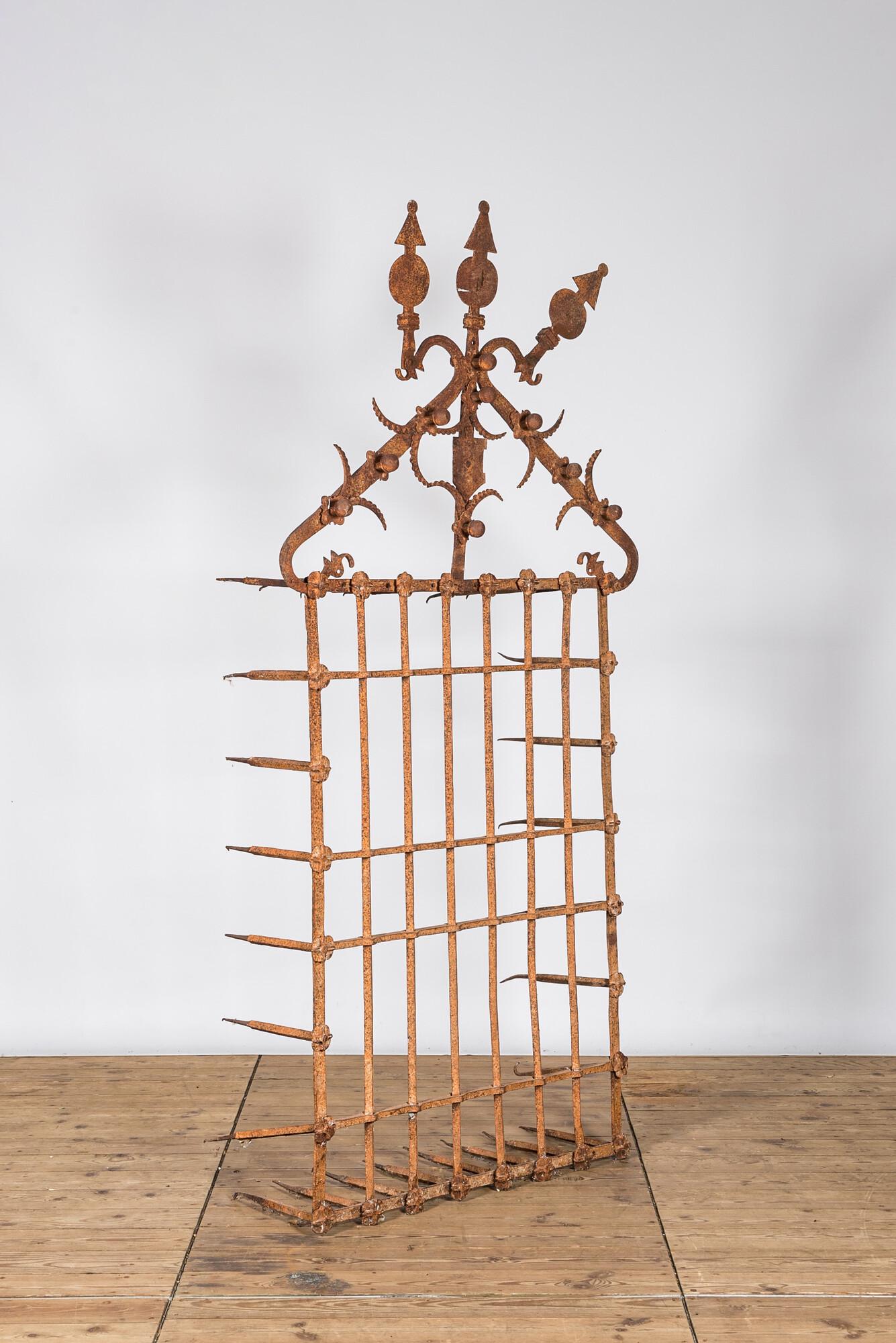 A Southern European wrought iron window grille, 19th C. (1 of 2)