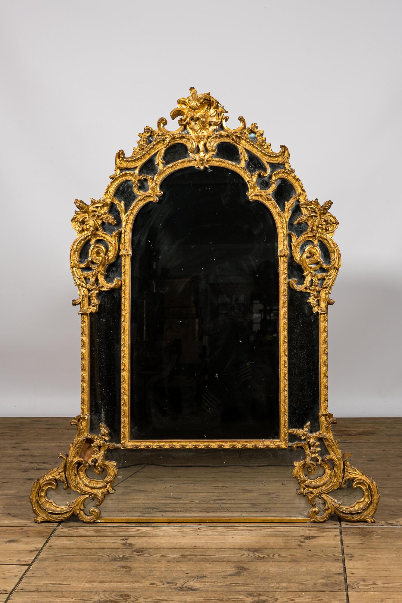 A French finely carved gilded wooden Louis XV-style rocaille mirror, 19th C. (1 of 3)