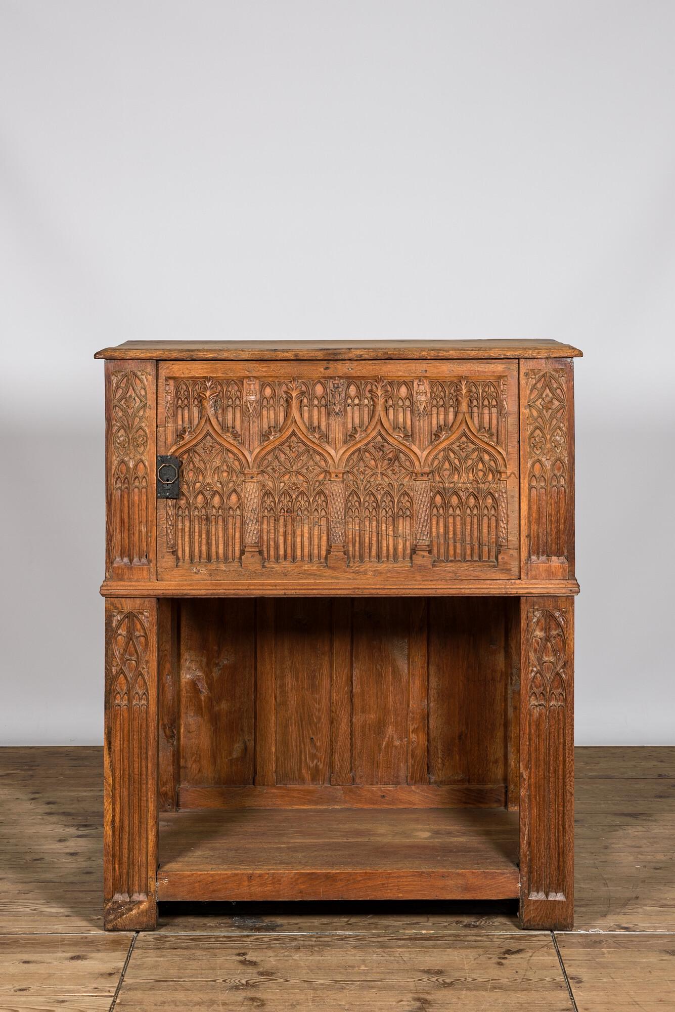 A Gothic Revival bleached oak wooden credenza, 19th C. (1 of 3)
