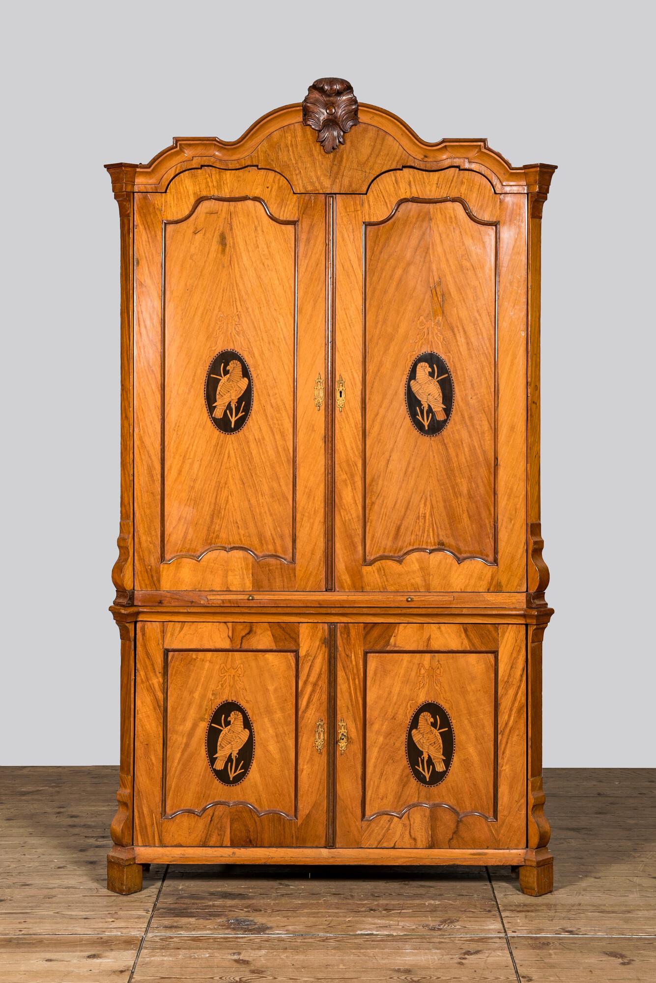 A fruit wood corner cabinet with marquetry design of parrots in medallions, last third 18th C. (1 of 3)