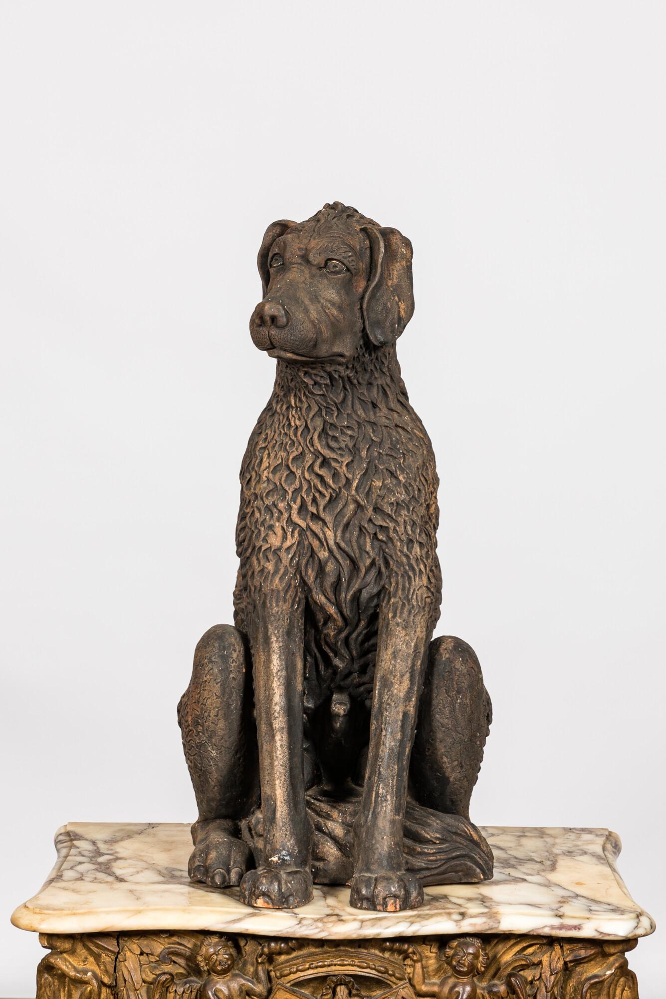 A patinated terracotta 'dog' sculpture, 19th C. (1 of 2)