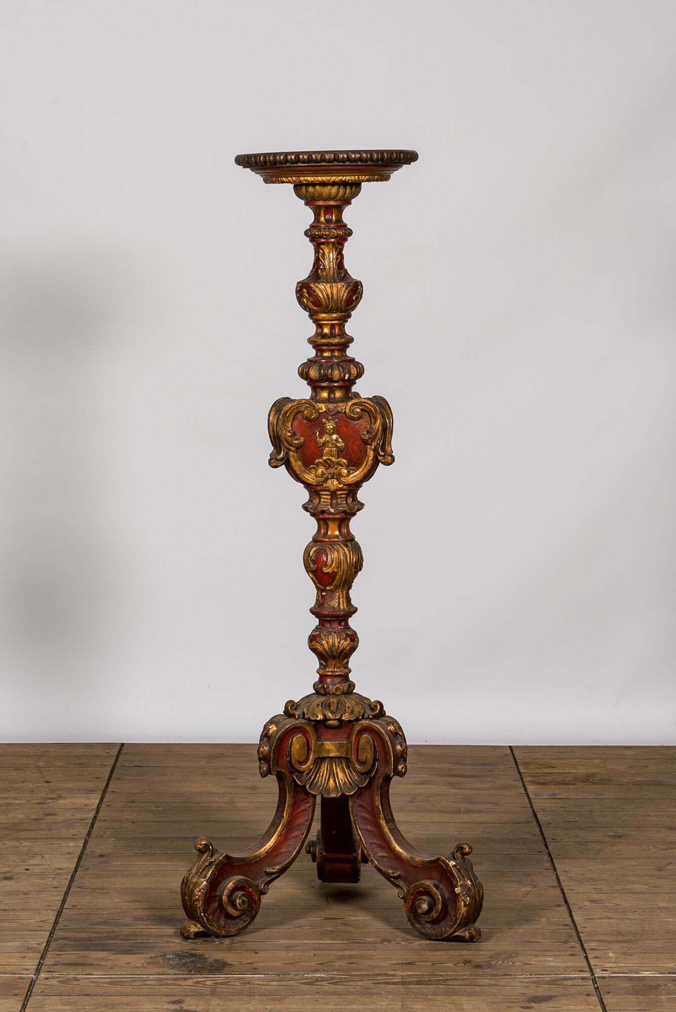 An Italian polychrome and gilt wooden church candlestick, 18th C (1 of 3)
